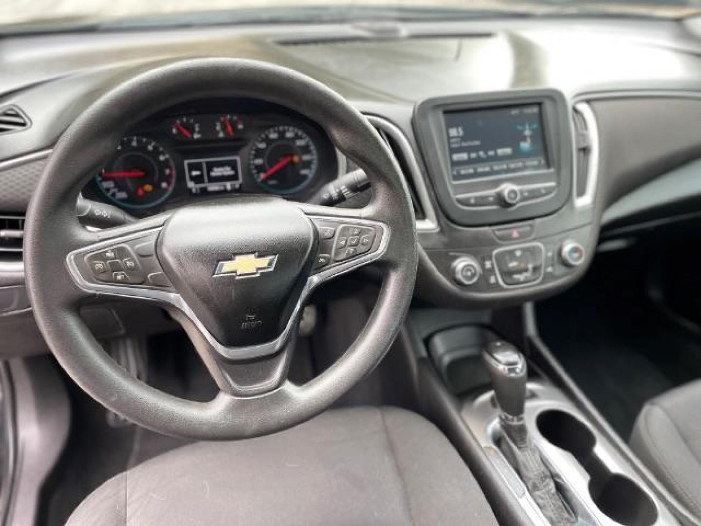 2016 Black Chevrolet Malibu LS (1G1ZB5ST9GF) with an 1.5L L4 DOHC 16V engine, 6-Speed Automatic transmission, located at 1806 Veterans Memorial Hwy SW, Austell, GA, 30168, (770) 944-9558, 33.817959, -84.606987 - Photo#10