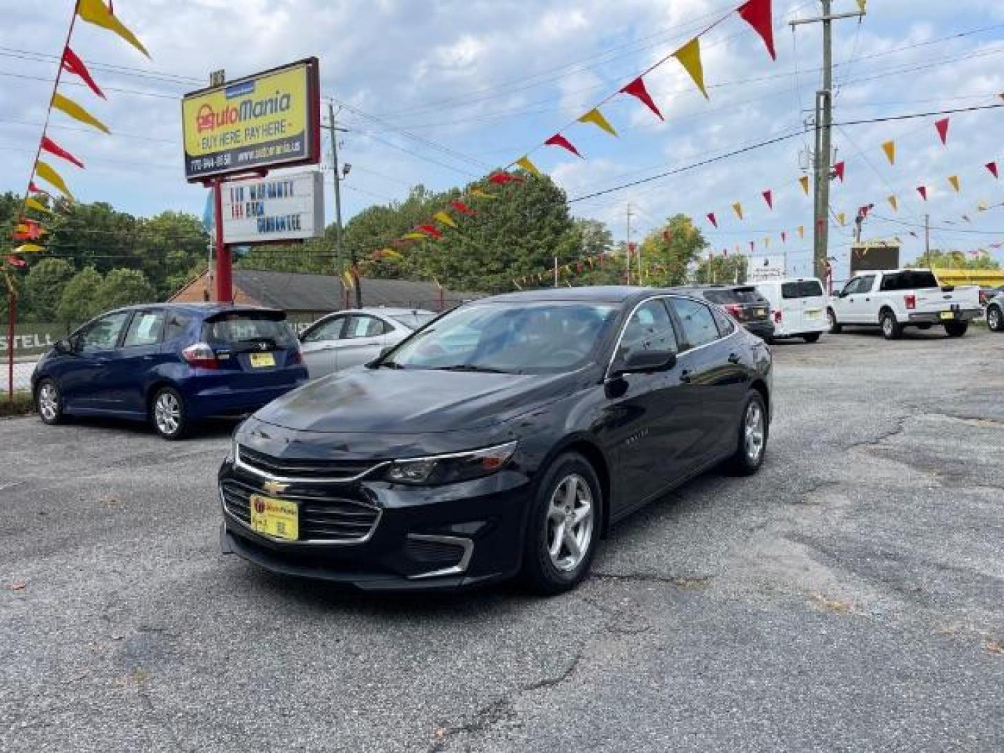 2016 Black Chevrolet Malibu LS (1G1ZB5ST9GF) with an 1.5L L4 DOHC 16V engine, 6-Speed Automatic transmission, located at 1806 Veterans Memorial Hwy SW, Austell, GA, 30168, (770) 944-9558, 33.817959, -84.606987 - Photo#0