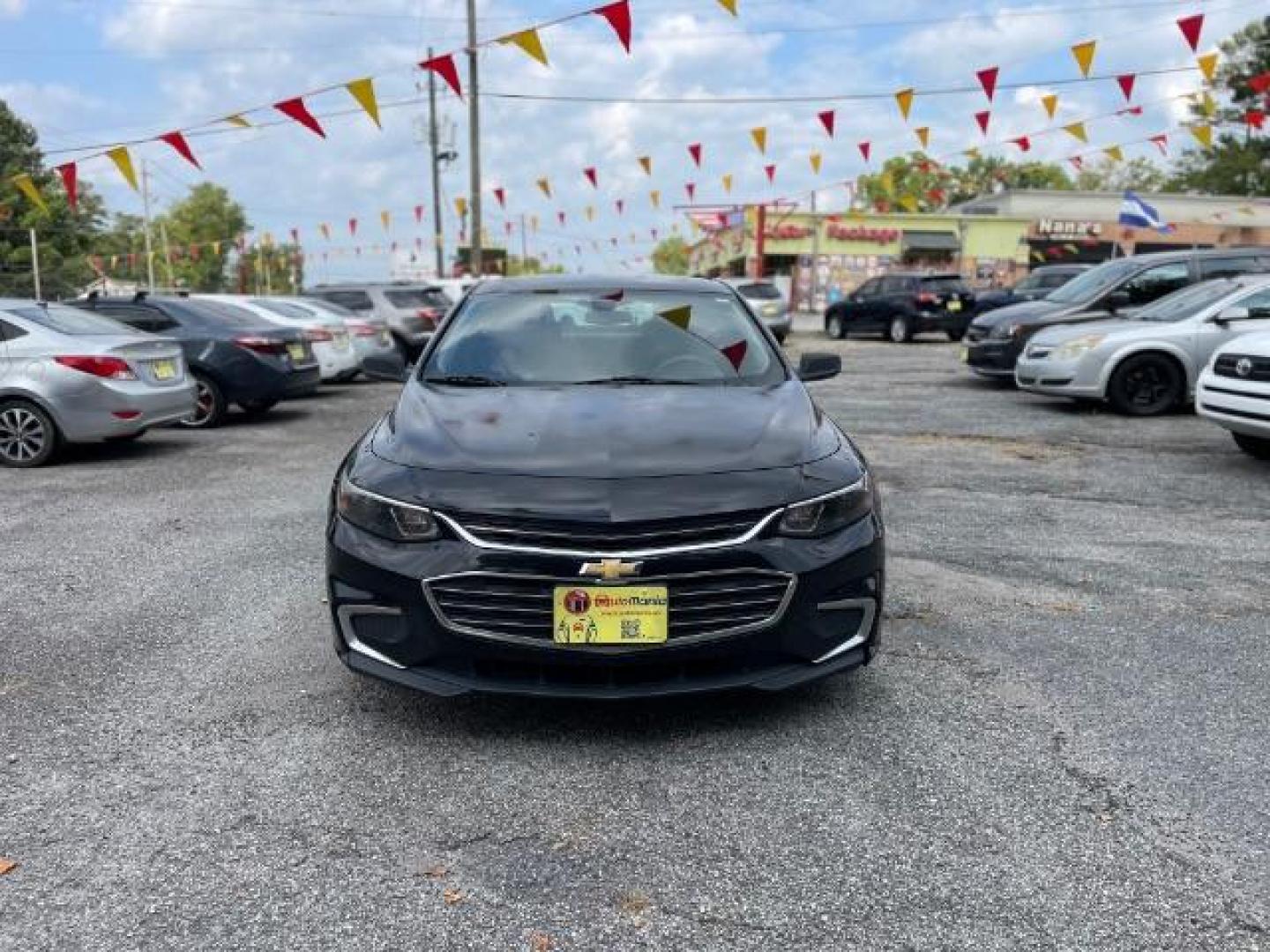 2016 Black Chevrolet Malibu LS (1G1ZB5ST9GF) with an 1.5L L4 DOHC 16V engine, 6-Speed Automatic transmission, located at 1806 Veterans Memorial Hwy SW, Austell, GA, 30168, (770) 944-9558, 33.817959, -84.606987 - Photo#1