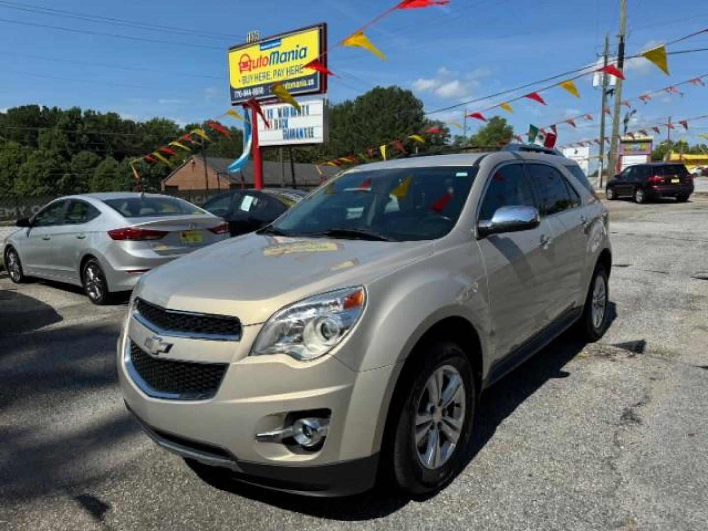 2012 Tan Chevrolet Equinox LTZ AWD (2GNFLGEK4C6) with an 2.4L L4 DOHC 16V engine, 6-Speed Automatic transmission, located at 1806 Veterans Memorial Hwy SW, Austell, GA, 30168, (770) 944-9558, 33.817959, -84.606987 - Photo#0