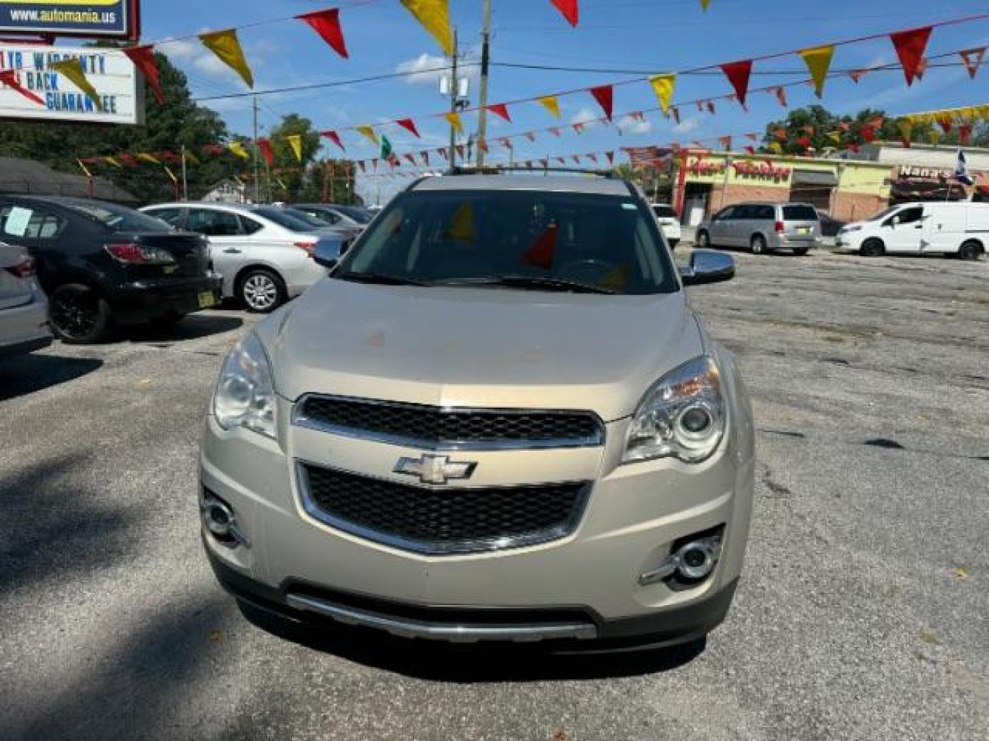 2012 Tan Chevrolet Equinox LTZ AWD (2GNFLGEK4C6) with an 2.4L L4 DOHC 16V engine, 6-Speed Automatic transmission, located at 1806 Veterans Memorial Hwy SW, Austell, GA, 30168, (770) 944-9558, 33.817959, -84.606987 - Photo#1