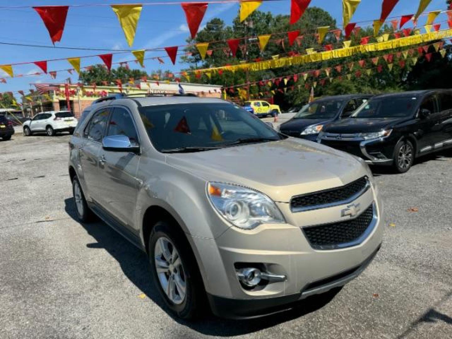 2012 Tan Chevrolet Equinox LTZ AWD (2GNFLGEK4C6) with an 2.4L L4 DOHC 16V engine, 6-Speed Automatic transmission, located at 1806 Veterans Memorial Hwy SW, Austell, GA, 30168, (770) 944-9558, 33.817959, -84.606987 - Photo#2