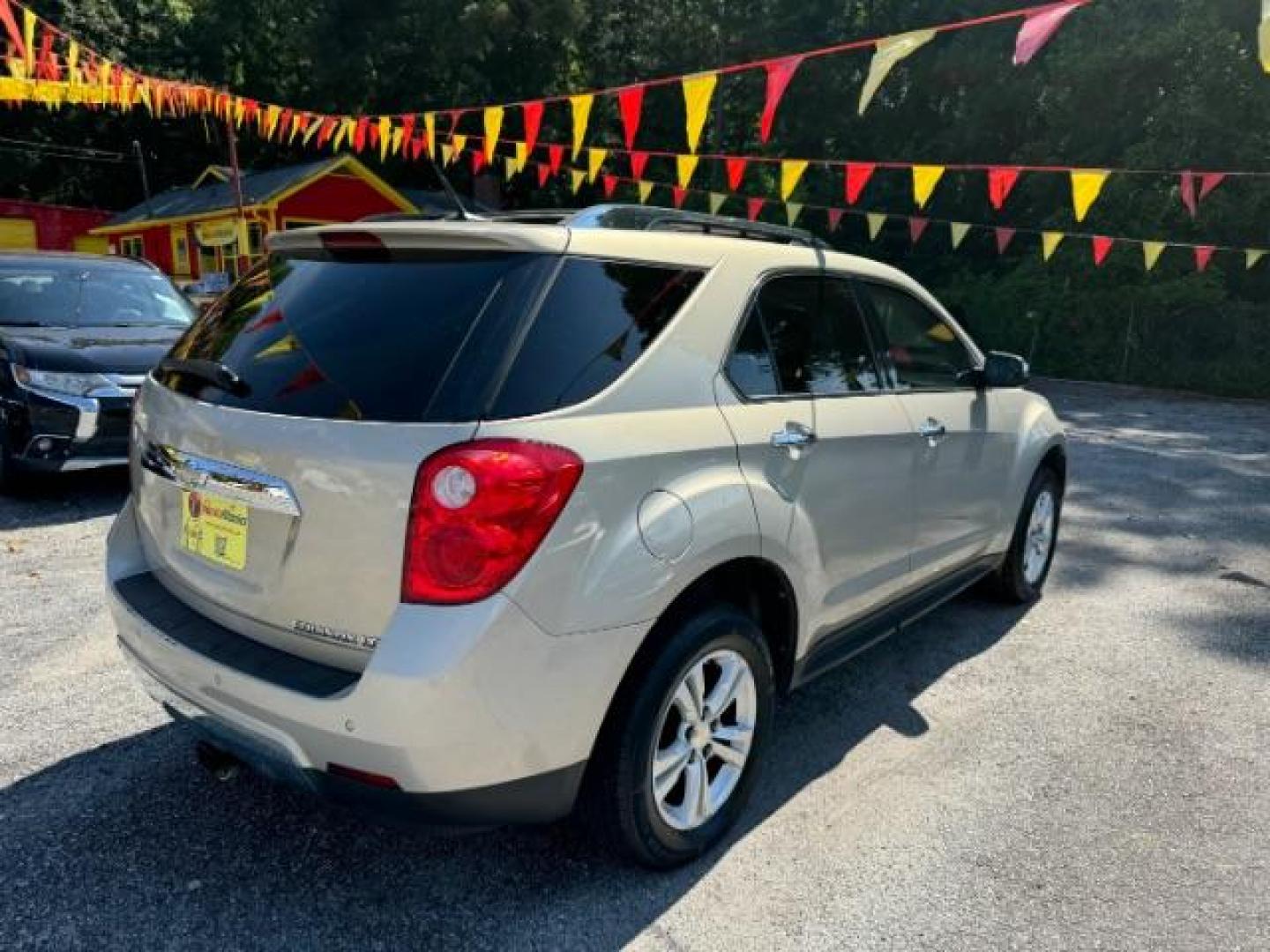 2012 Tan Chevrolet Equinox LTZ AWD (2GNFLGEK4C6) with an 2.4L L4 DOHC 16V engine, 6-Speed Automatic transmission, located at 1806 Veterans Memorial Hwy SW, Austell, GA, 30168, (770) 944-9558, 33.817959, -84.606987 - Photo#4