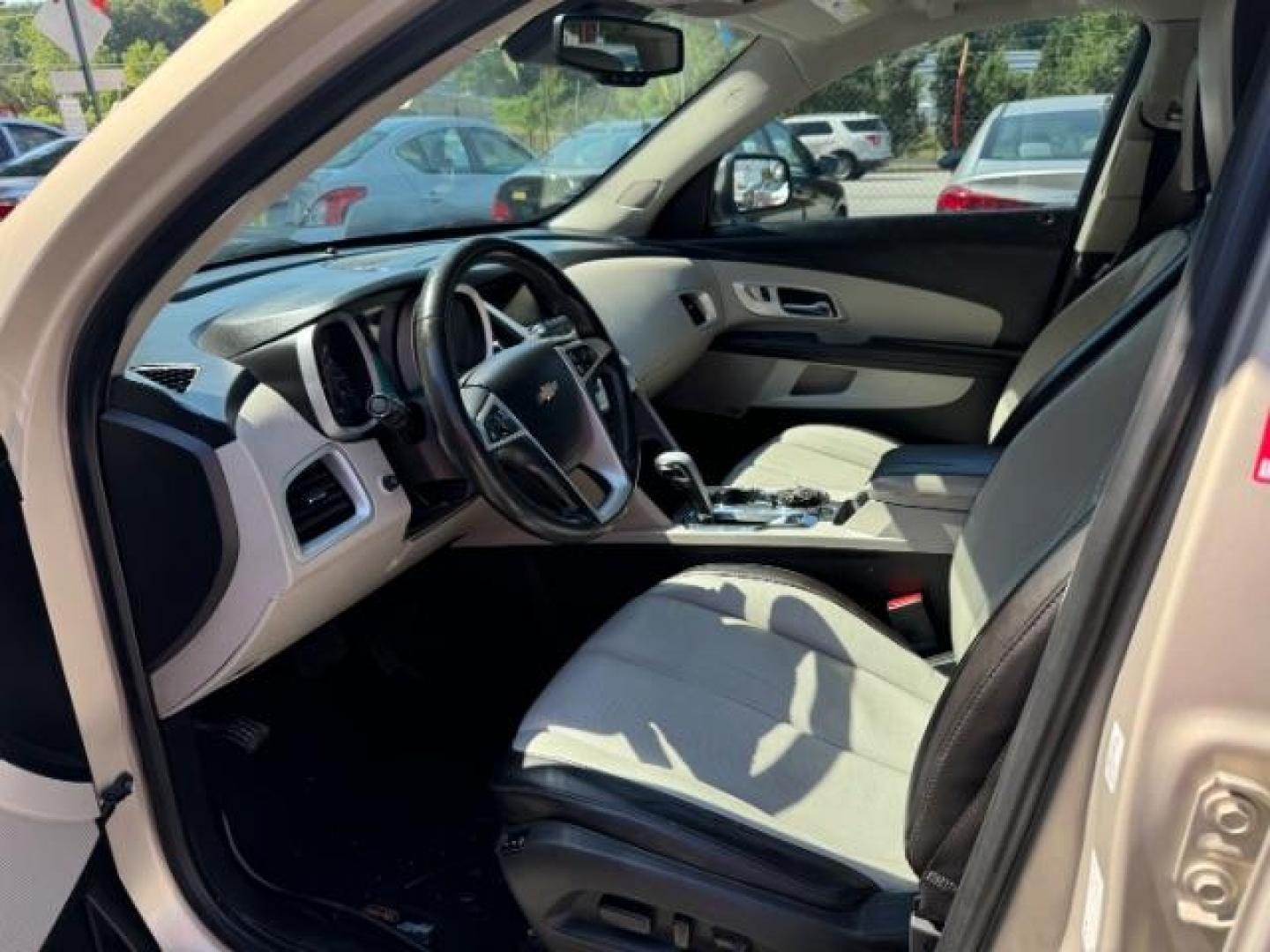 2012 Tan Chevrolet Equinox LTZ AWD (2GNFLGEK4C6) with an 2.4L L4 DOHC 16V engine, 6-Speed Automatic transmission, located at 1806 Veterans Memorial Hwy SW, Austell, GA, 30168, (770) 944-9558, 33.817959, -84.606987 - Photo#6