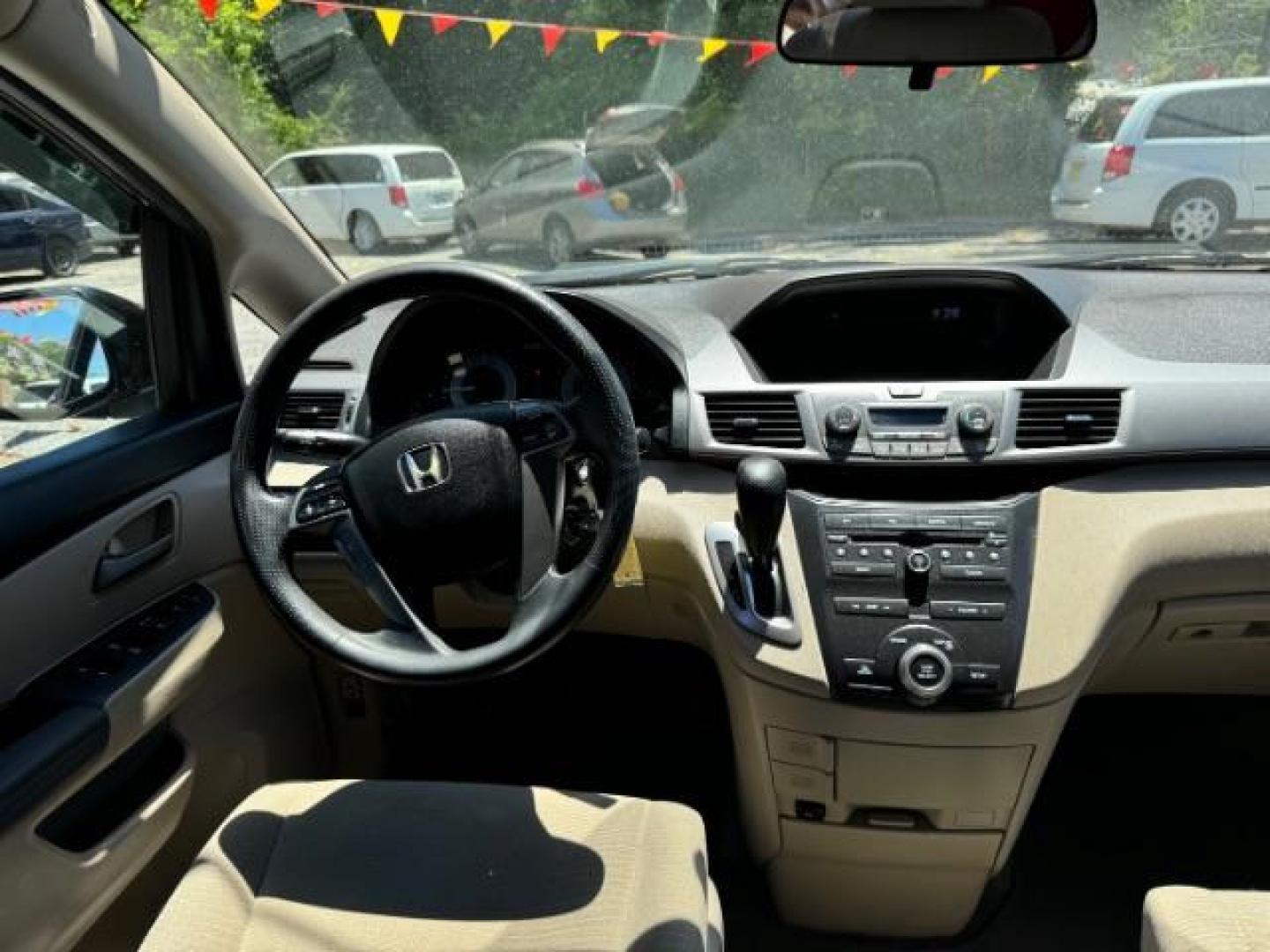 2012 Maroon Honda Odyssey EX (5FNRL5H44CB) with an 3.5L V6 SOHC 24V engine, 5-Speed Automatic transmission, located at 1806 Veterans Memorial Hwy SW, Austell, GA, 30168, (770) 944-9558, 33.817959, -84.606987 - Photo#11