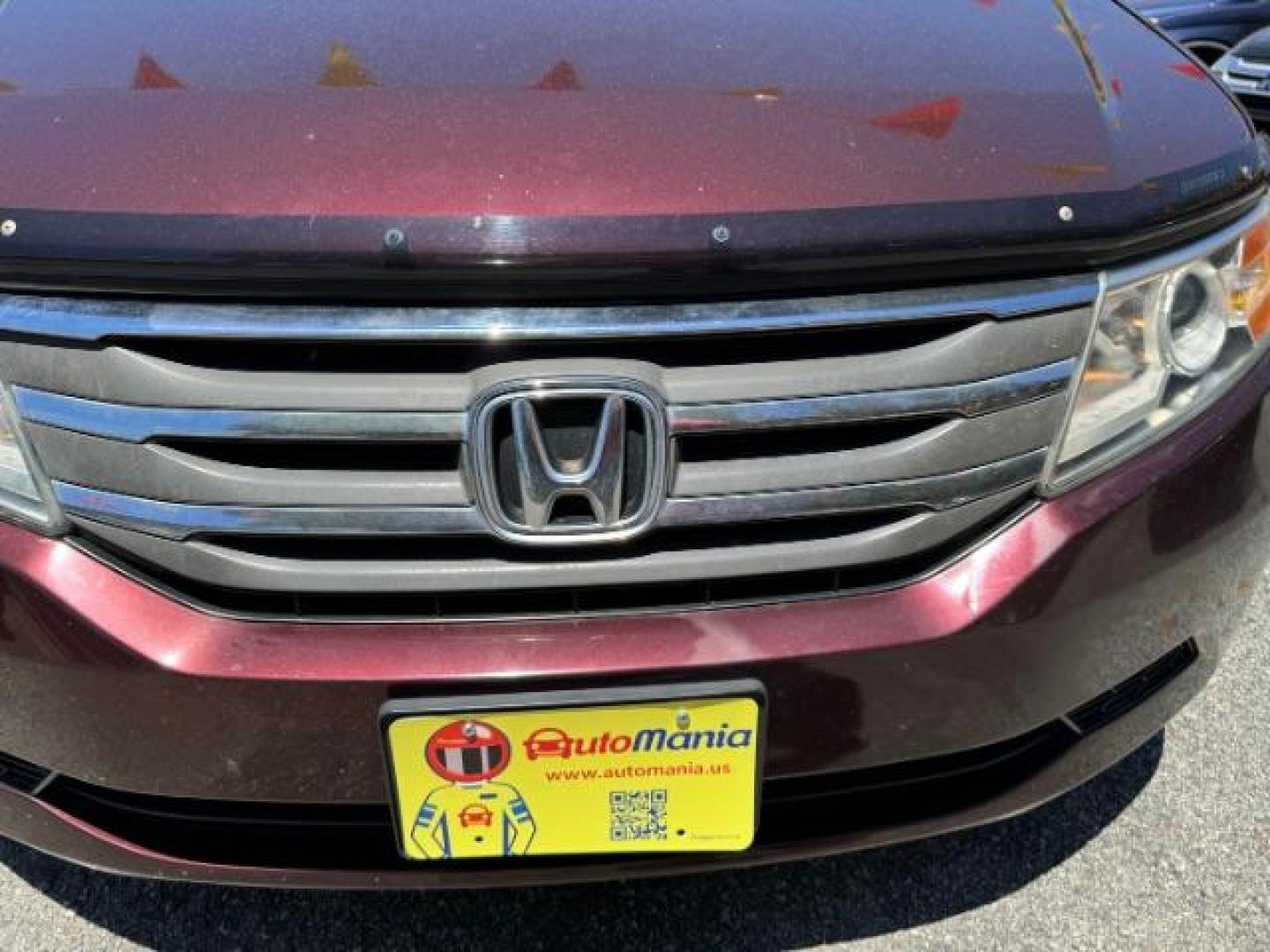 2012 Maroon Honda Odyssey EX (5FNRL5H44CB) with an 3.5L V6 SOHC 24V engine, 5-Speed Automatic transmission, located at 1806 Veterans Memorial Hwy SW, Austell, GA, 30168, (770) 944-9558, 33.817959, -84.606987 - Photo#19