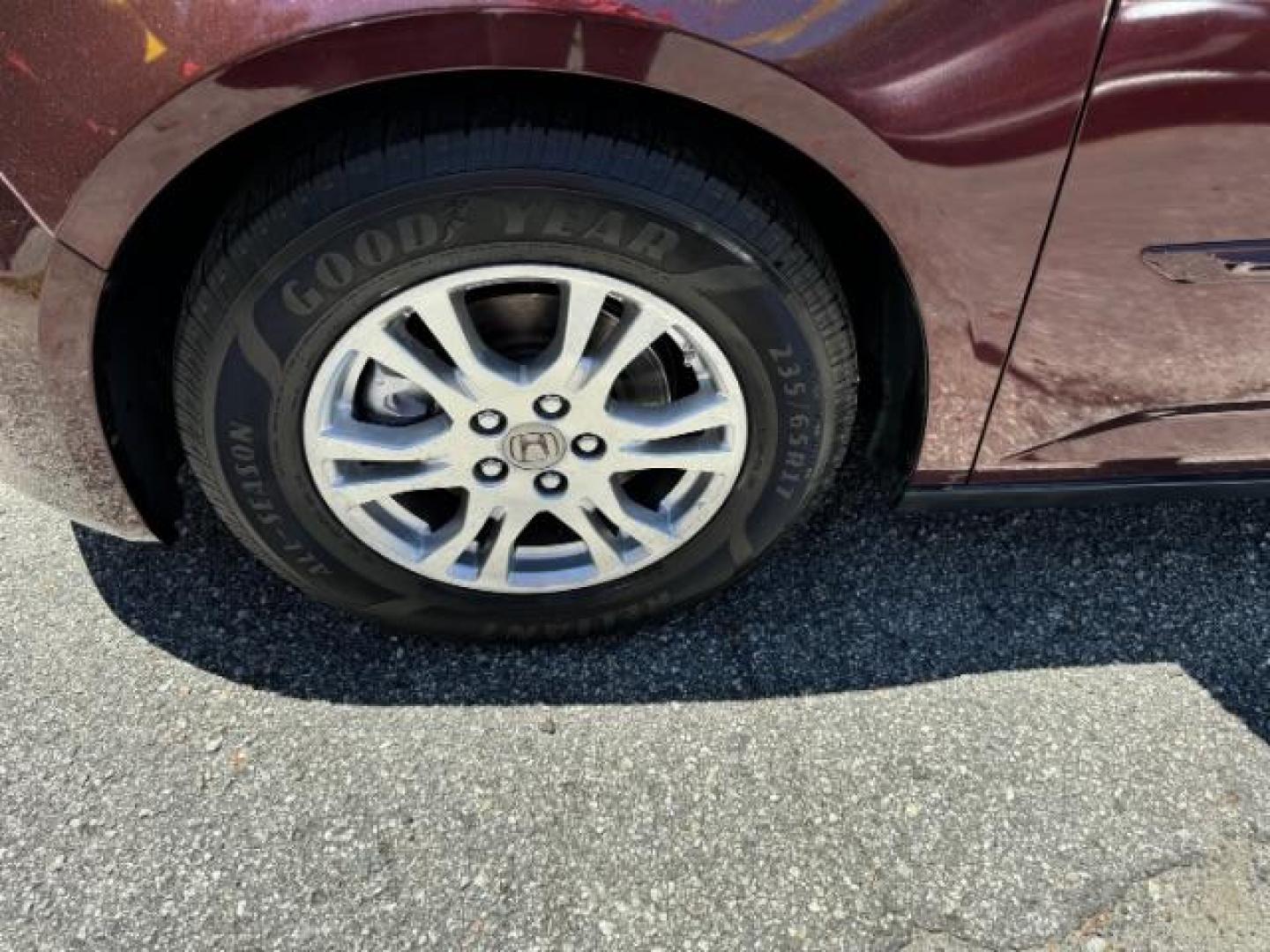 2012 Maroon Honda Odyssey EX (5FNRL5H44CB) with an 3.5L V6 SOHC 24V engine, 5-Speed Automatic transmission, located at 1806 Veterans Memorial Hwy SW, Austell, GA, 30168, (770) 944-9558, 33.817959, -84.606987 - Photo#20