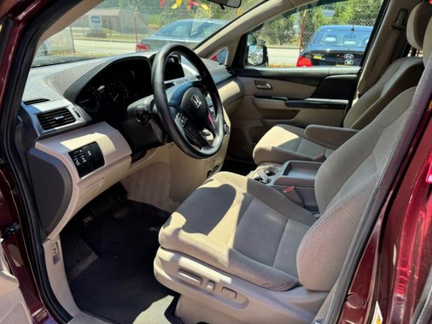 2012 Maroon Honda Odyssey EX (5FNRL5H44CB) with an 3.5L V6 SOHC 24V engine, 5-Speed Automatic transmission, located at 1806 Veterans Memorial Hwy SW, Austell, GA, 30168, (770) 944-9558, 33.817959, -84.606987 - Photo#6