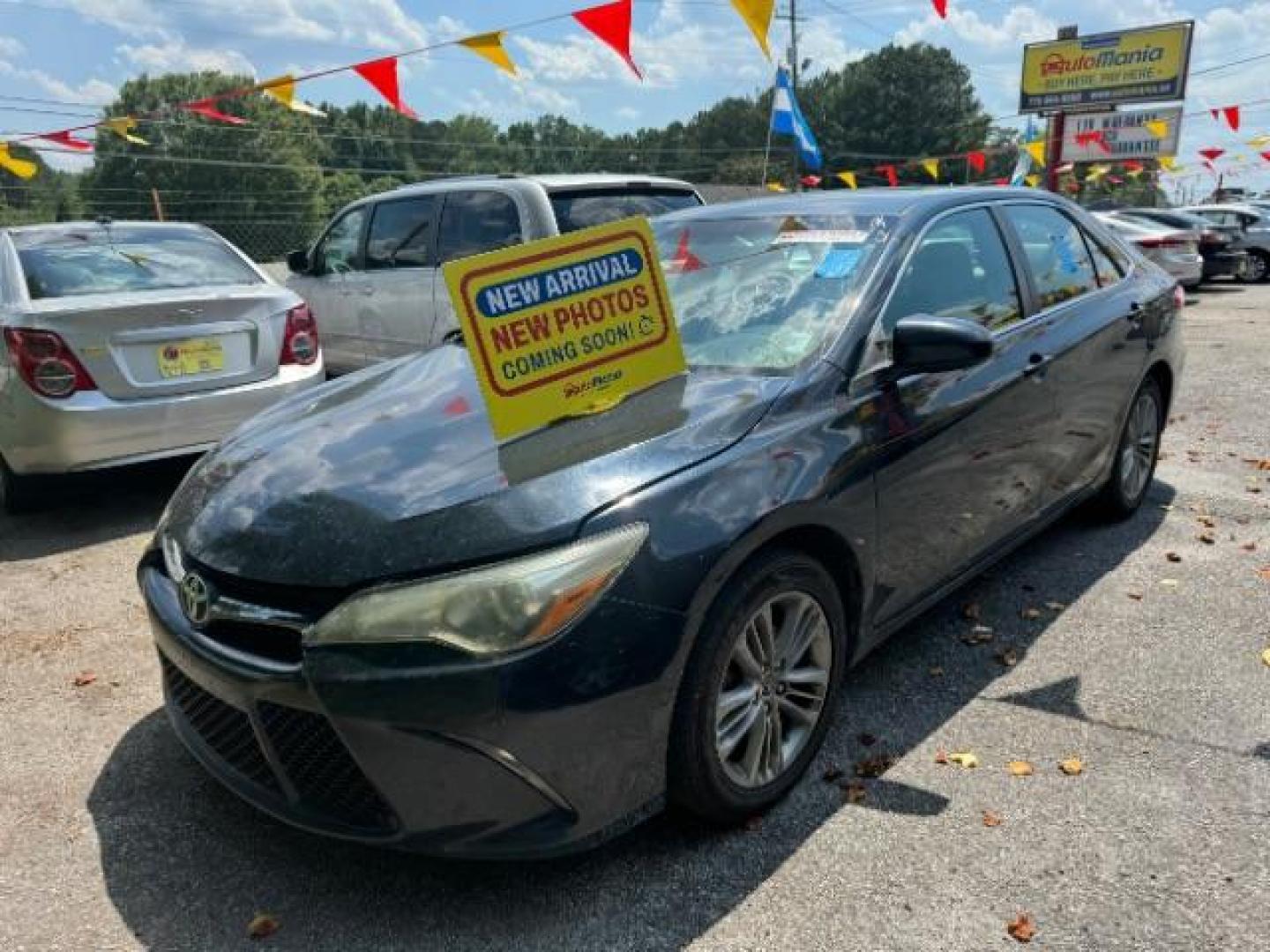 2015 Black Toyota Camry LE (4T1BF1FK5FU) with an 2.5L L4 DOHC 16V engine, 6-Speed Automatic transmission, located at 1806 Veterans Memorial Hwy SW, Austell, GA, 30168, (770) 944-9558, 33.817959, -84.606987 - Photo#0