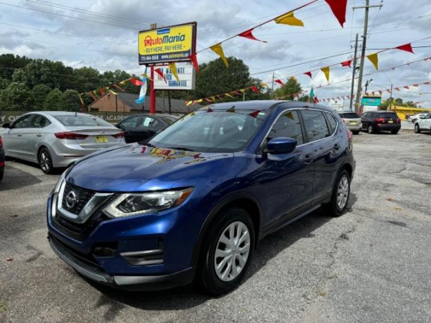 2017 Blue Nissan Rogue S 2WD (5N1AT2MT1HC) with an 2.5L L4 DOHC 16V engine, Continuously Variable Transmission transmission, located at 1806 Veterans Memorial Hwy SW, Austell, GA, 30168, (770) 944-9558, 33.817959, -84.606987 - Photo#0