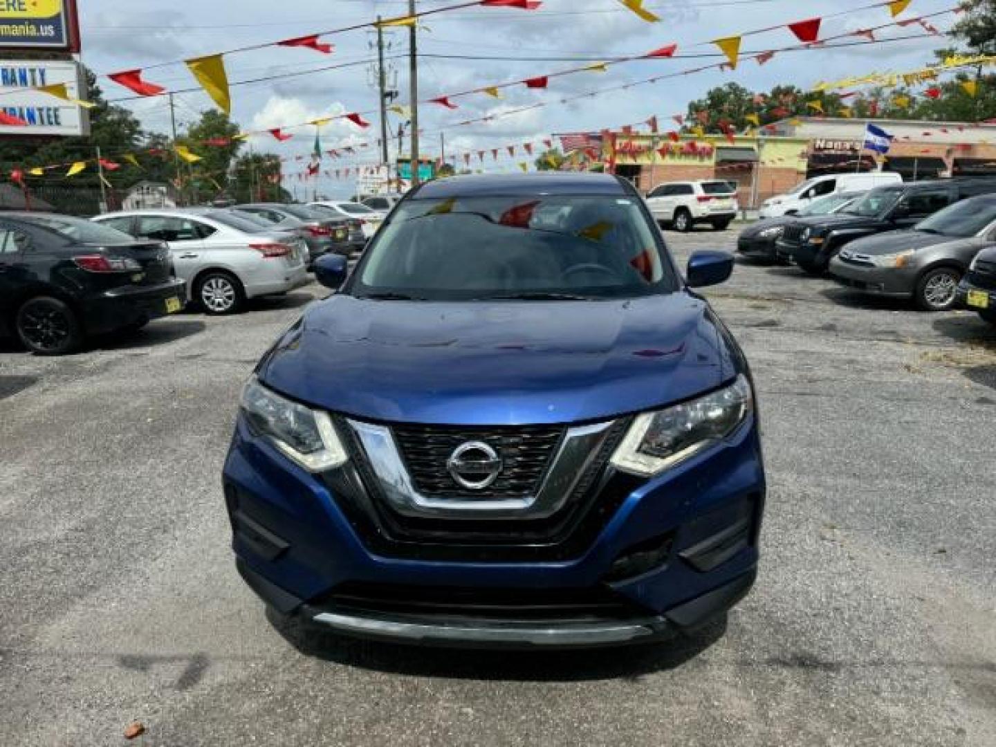 2017 Blue Nissan Rogue S 2WD (5N1AT2MT1HC) with an 2.5L L4 DOHC 16V engine, Continuously Variable Transmission transmission, located at 1806 Veterans Memorial Hwy SW, Austell, GA, 30168, (770) 944-9558, 33.817959, -84.606987 - Photo#1