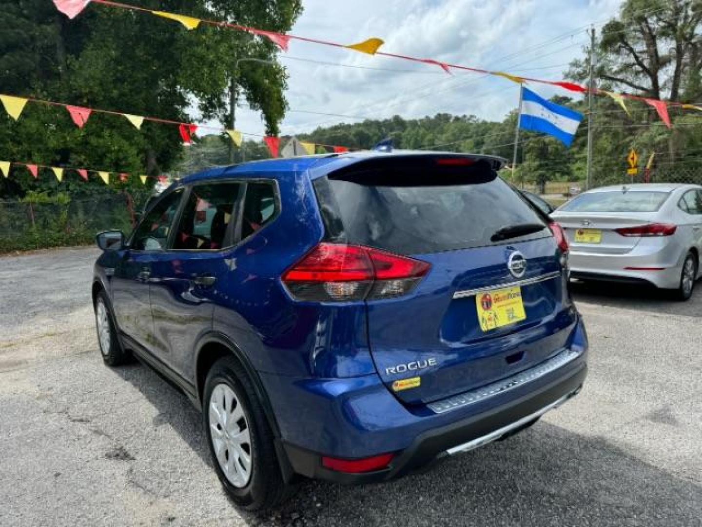 2017 Blue Nissan Rogue S 2WD (5N1AT2MT1HC) with an 2.5L L4 DOHC 16V engine, Continuously Variable Transmission transmission, located at 1806 Veterans Memorial Hwy SW, Austell, GA, 30168, (770) 944-9558, 33.817959, -84.606987 - Photo#4