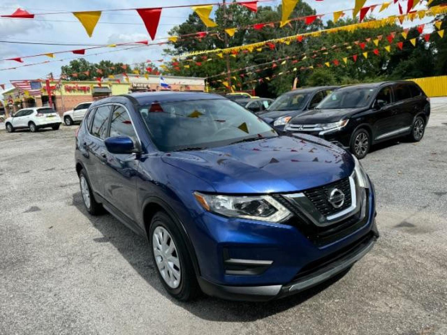 2017 Blue Nissan Rogue S 2WD (5N1AT2MT1HC) with an 2.5L L4 DOHC 16V engine, Continuously Variable Transmission transmission, located at 1806 Veterans Memorial Hwy SW, Austell, GA, 30168, (770) 944-9558, 33.817959, -84.606987 - Photo#7