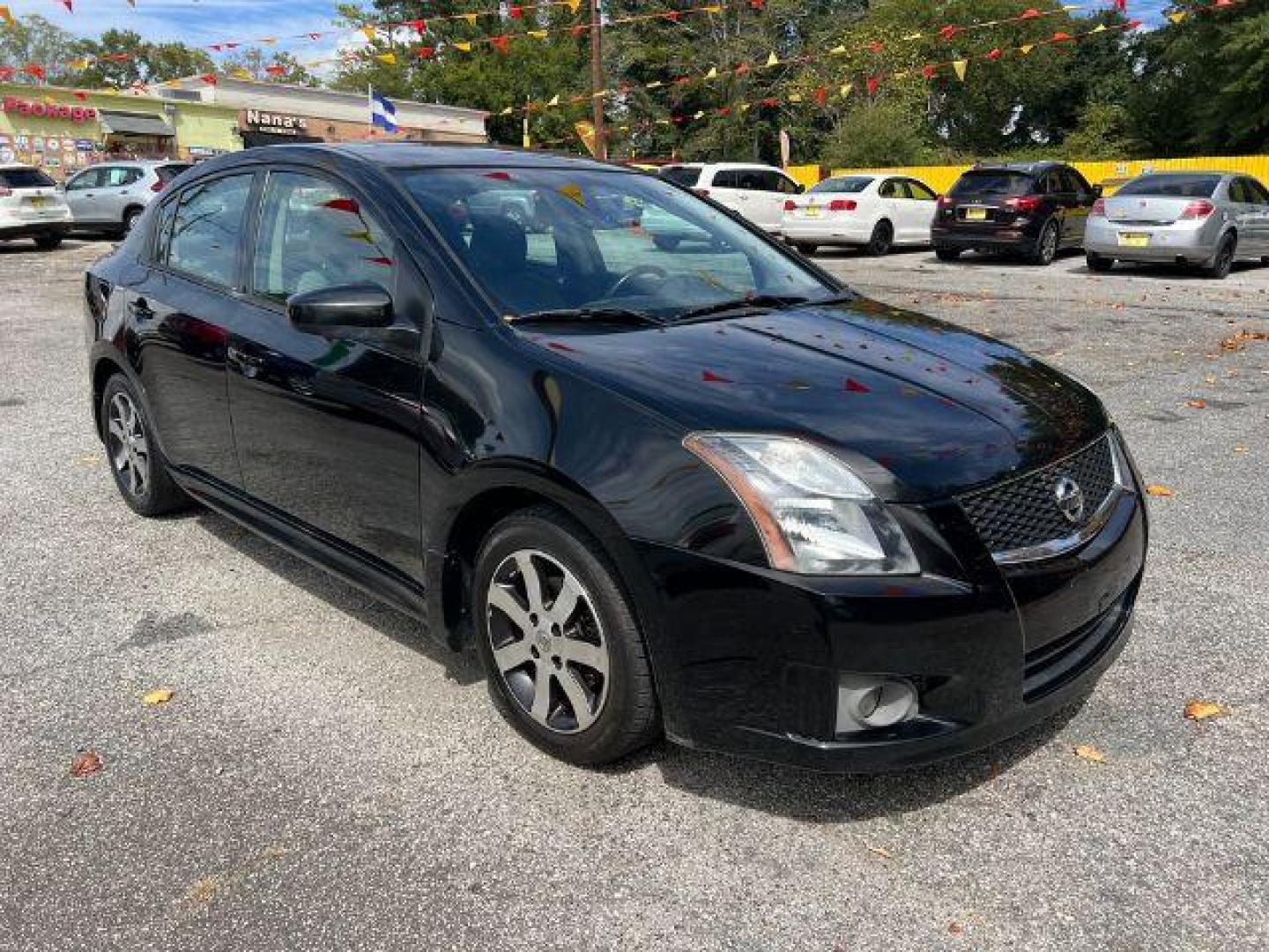 2012 Black Nissan Sentra 2.0 SR (3N1AB6AP8CL) with an 2.0L L4 DOHC 16V engine, Continuously Variable Transmission transmission, located at 1806 Veterans Memorial Hwy SW, Austell, GA, 30168, (770) 944-9558, 33.817959, -84.606987 - Photo#9