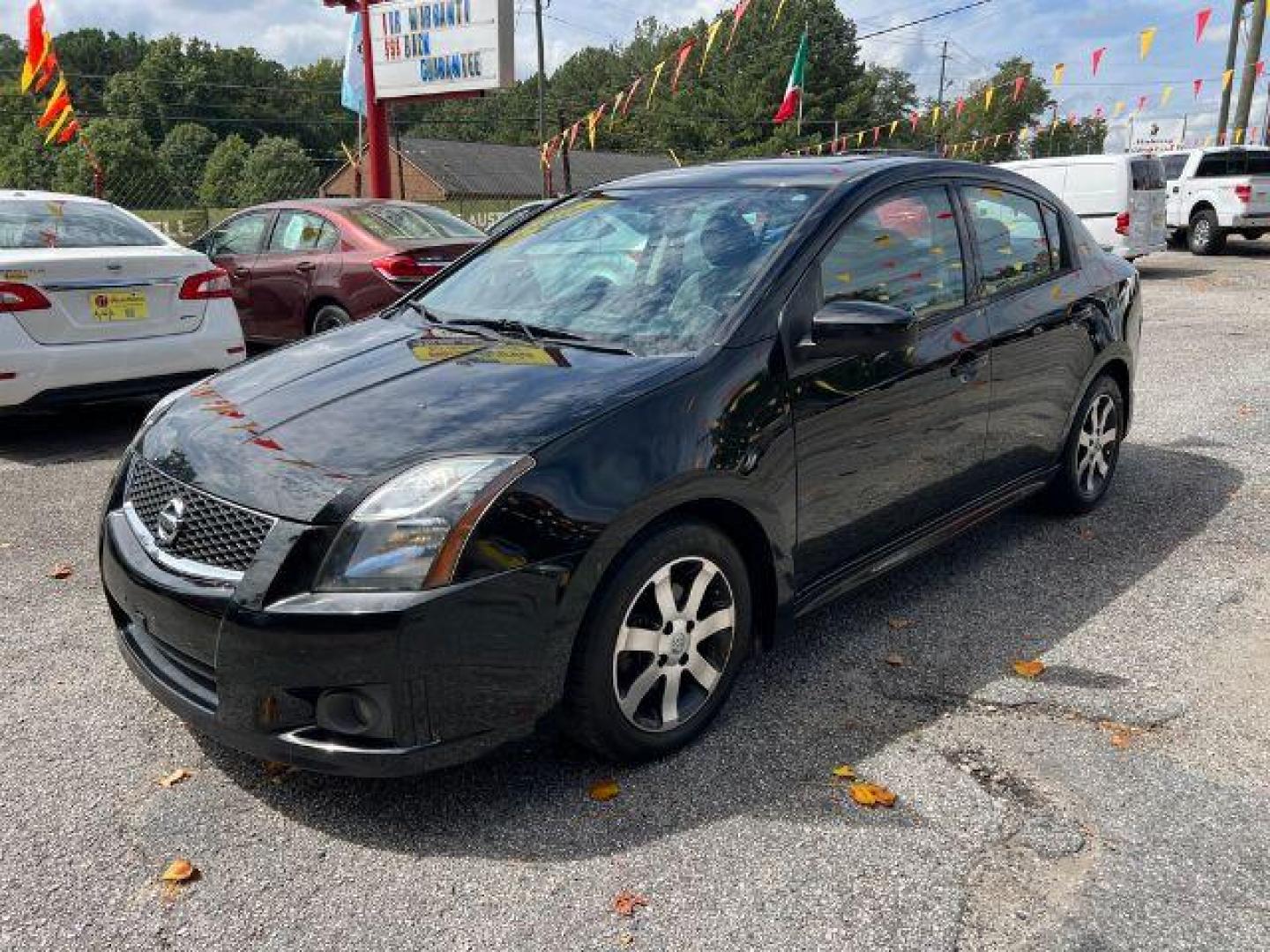 2012 Black Nissan Sentra 2.0 SR (3N1AB6AP8CL) with an 2.0L L4 DOHC 16V engine, Continuously Variable Transmission transmission, located at 1806 Veterans Memorial Hwy SW, Austell, GA, 30168, (770) 944-9558, 33.817959, -84.606987 - Photo#0