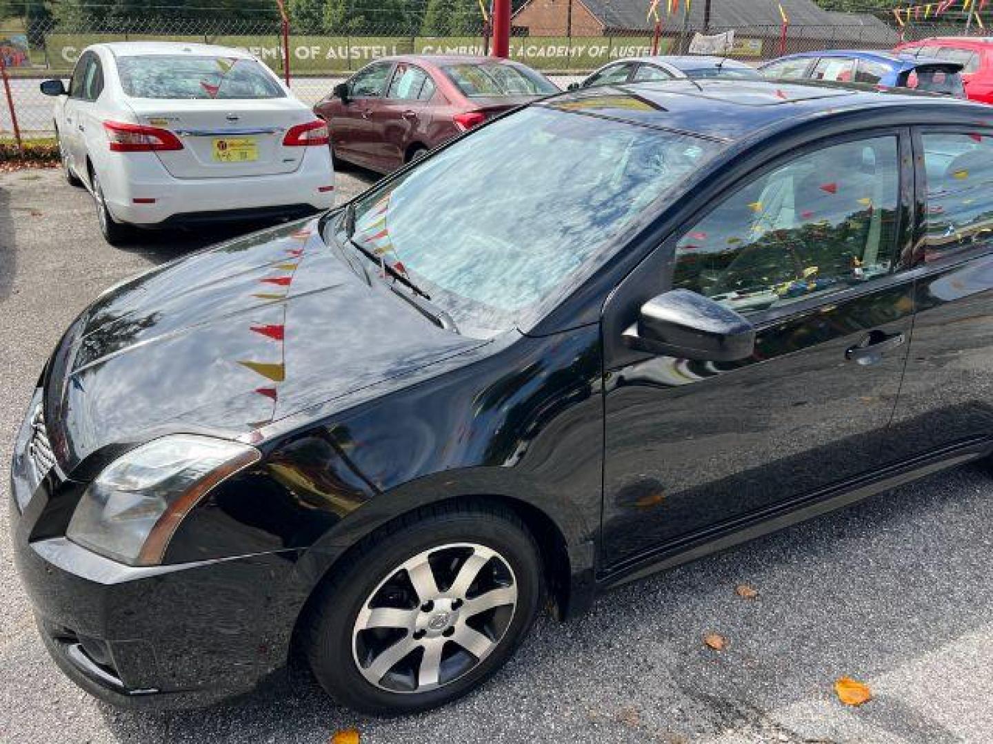 2012 Black Nissan Sentra 2.0 SR (3N1AB6AP8CL) with an 2.0L L4 DOHC 16V engine, Continuously Variable Transmission transmission, located at 1806 Veterans Memorial Hwy SW, Austell, GA, 30168, (770) 944-9558, 33.817959, -84.606987 - Photo#1