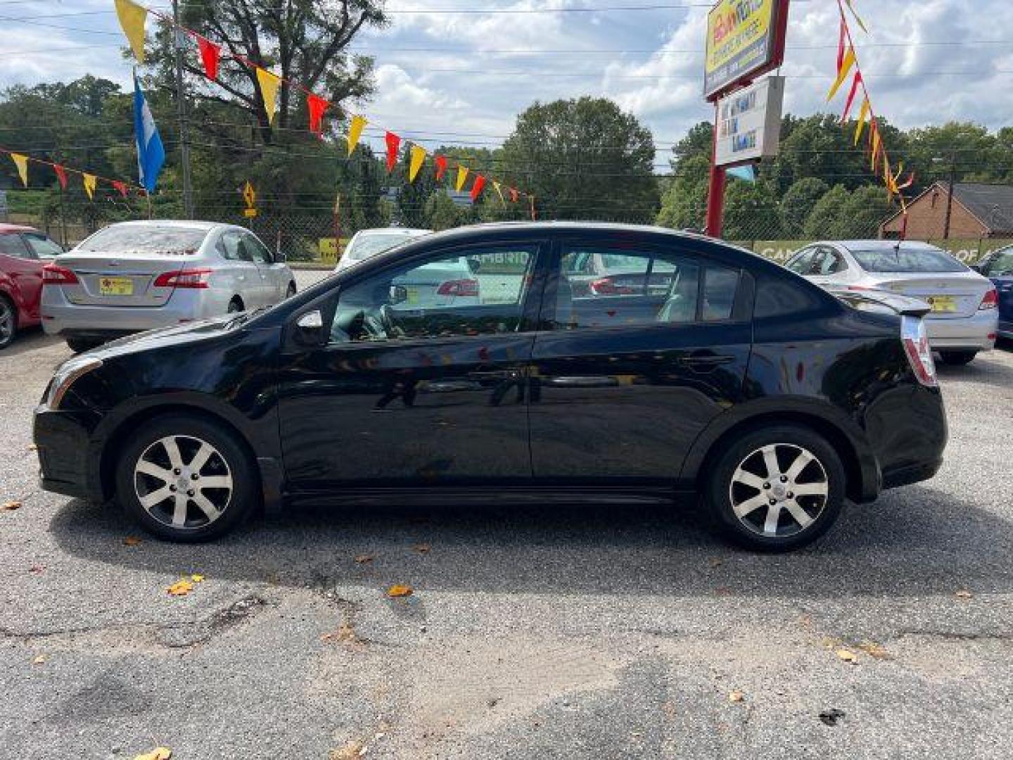 2012 Black Nissan Sentra 2.0 SR (3N1AB6AP8CL) with an 2.0L L4 DOHC 16V engine, Continuously Variable Transmission transmission, located at 1806 Veterans Memorial Hwy SW, Austell, GA, 30168, (770) 944-9558, 33.817959, -84.606987 - Photo#2