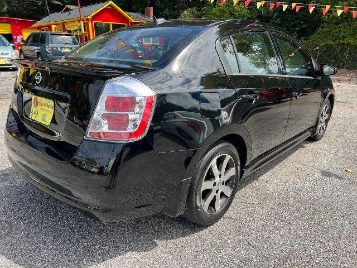 2012 Black Nissan Sentra 2.0 SR (3N1AB6AP8CL) with an 2.0L L4 DOHC 16V engine, Continuously Variable Transmission transmission, located at 1806 Veterans Memorial Hwy SW, Austell, GA, 30168, (770) 944-9558, 33.817959, -84.606987 - Photo#6