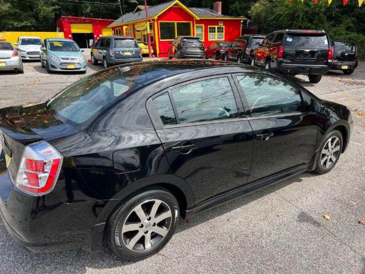 2012 Black Nissan Sentra 2.0 SR (3N1AB6AP8CL) with an 2.0L L4 DOHC 16V engine, Continuously Variable Transmission transmission, located at 1806 Veterans Memorial Hwy SW, Austell, GA, 30168, (770) 944-9558, 33.817959, -84.606987 - Photo#7