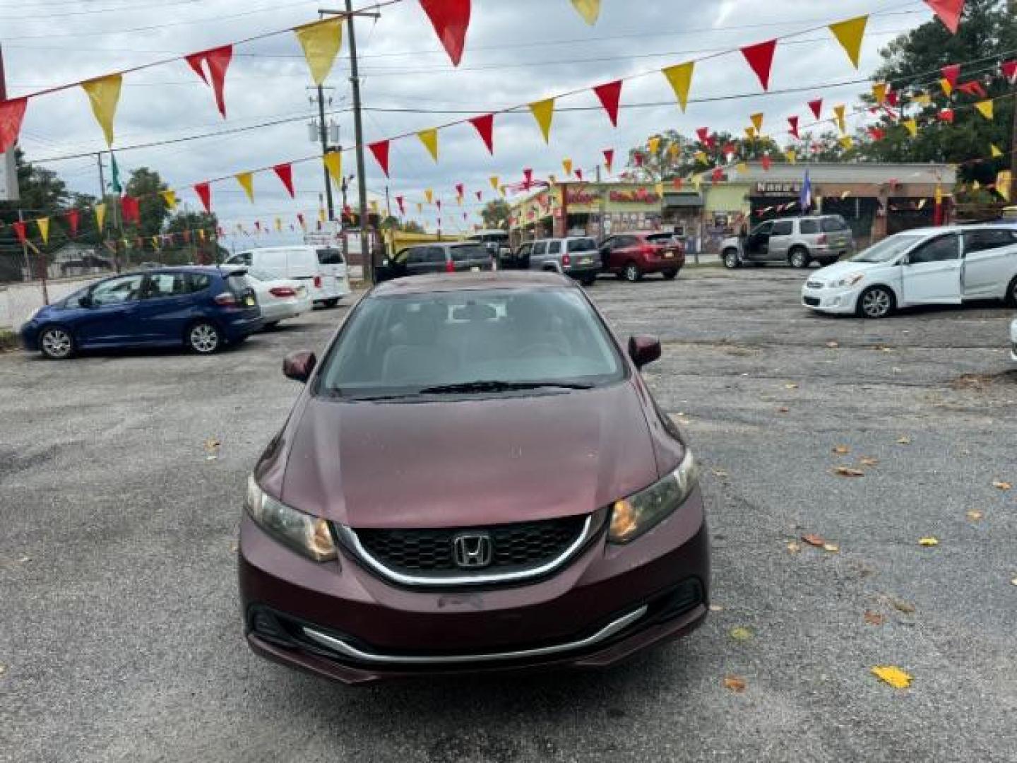 2013 Burgundy Honda Civic LX Sedan 5-Speed AT (19XFB2F59DE) with an 1.8L L4 SOHC 16V engine, 5-Speed Automatic transmission, located at 1806 Veterans Memorial Hwy SW, Austell, GA, 30168, (770) 944-9558, 33.817959, -84.606987 - Photo#1