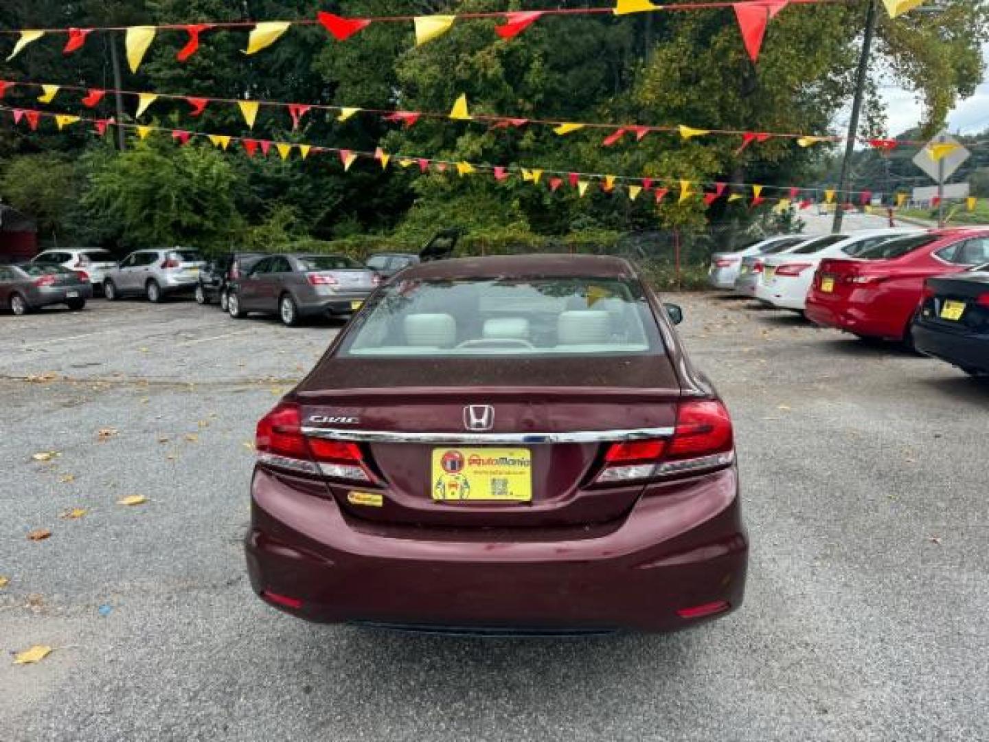 2013 Burgundy Honda Civic LX Sedan 5-Speed AT (19XFB2F59DE) with an 1.8L L4 SOHC 16V engine, 5-Speed Automatic transmission, located at 1806 Veterans Memorial Hwy SW, Austell, GA, 30168, (770) 944-9558, 33.817959, -84.606987 - Photo#4