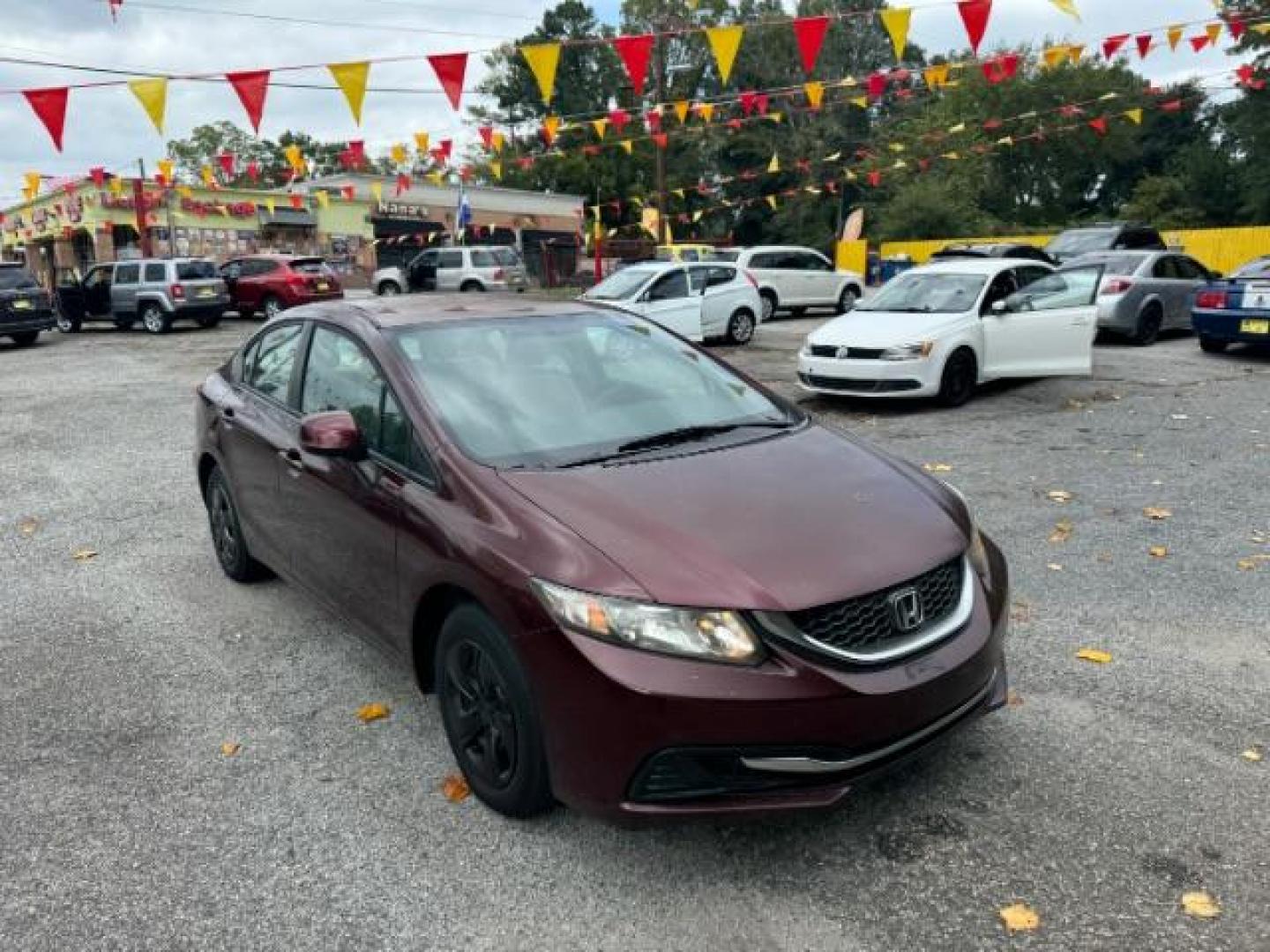 2013 Burgundy Honda Civic LX Sedan 5-Speed AT (19XFB2F59DE) with an 1.8L L4 SOHC 16V engine, 5-Speed Automatic transmission, located at 1806 Veterans Memorial Hwy SW, Austell, GA, 30168, (770) 944-9558, 33.817959, -84.606987 - Photo#2