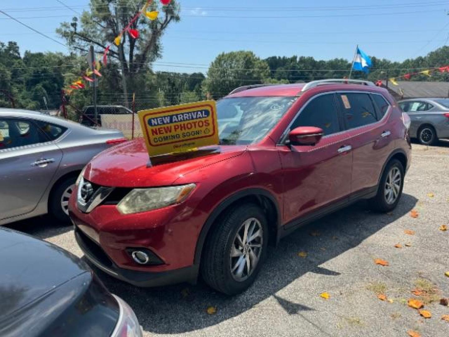 2015 Maroon Nissan Rogue S 2WD (5N1AT2MTXFC) with an 2.5L L4 DOHC 16V engine, Continuously Variable Transmission transmission, located at 1806 Veterans Memorial Hwy SW, Austell, GA, 30168, (770) 944-9558, 33.817959, -84.606987 - Photo#0