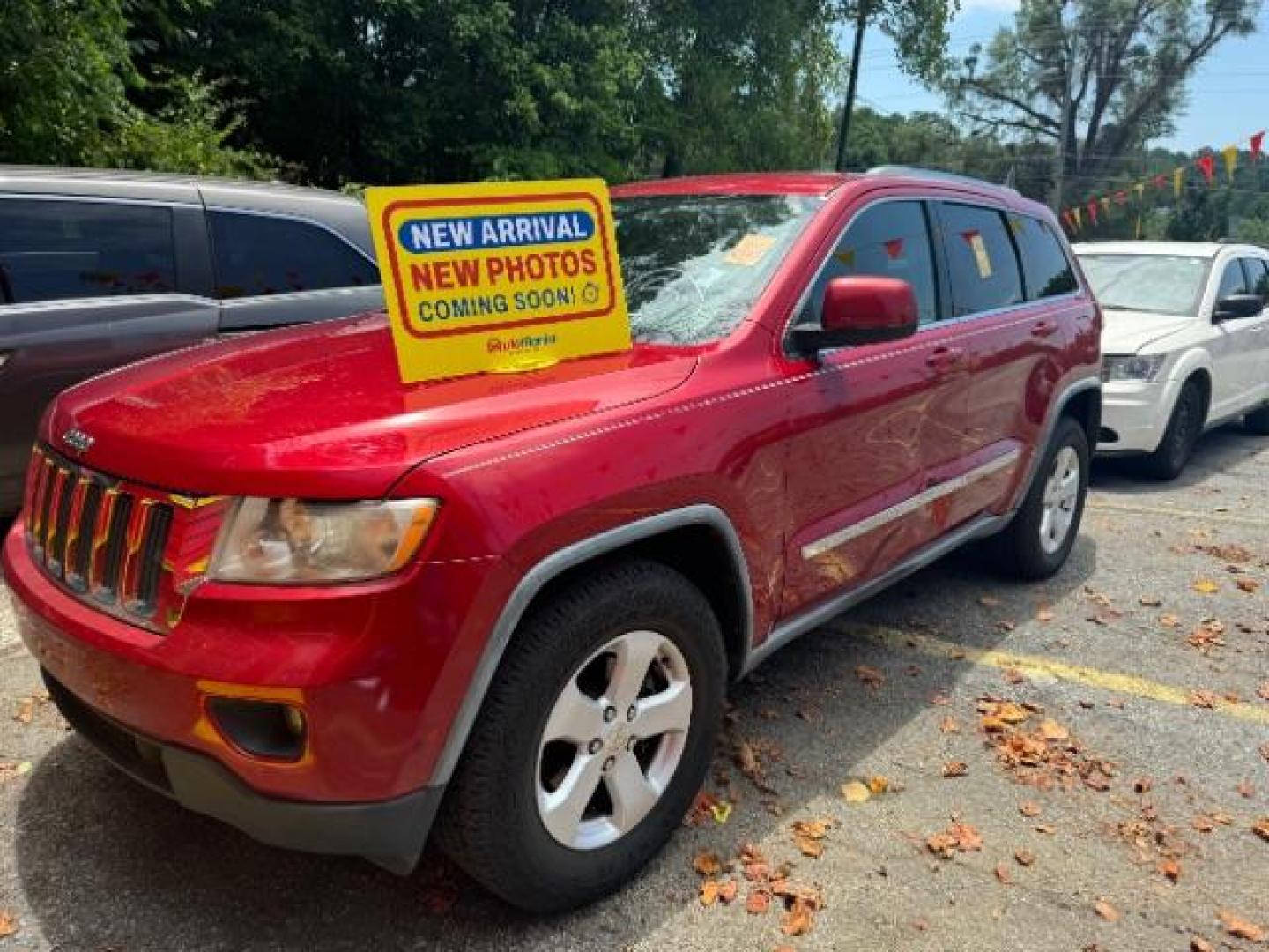 2011 Maroon Jeep Grand Cherokee SPORT UTILITY 4-DR (1J4RS4GG3BC) with an 3.6L V6 DOHC 24V engine, 5-Speed Automatic transmission, located at 1806 Veterans Memorial Hwy SW, Austell, GA, 30168, (770) 944-9558, 33.817959, -84.606987 - Photo#0