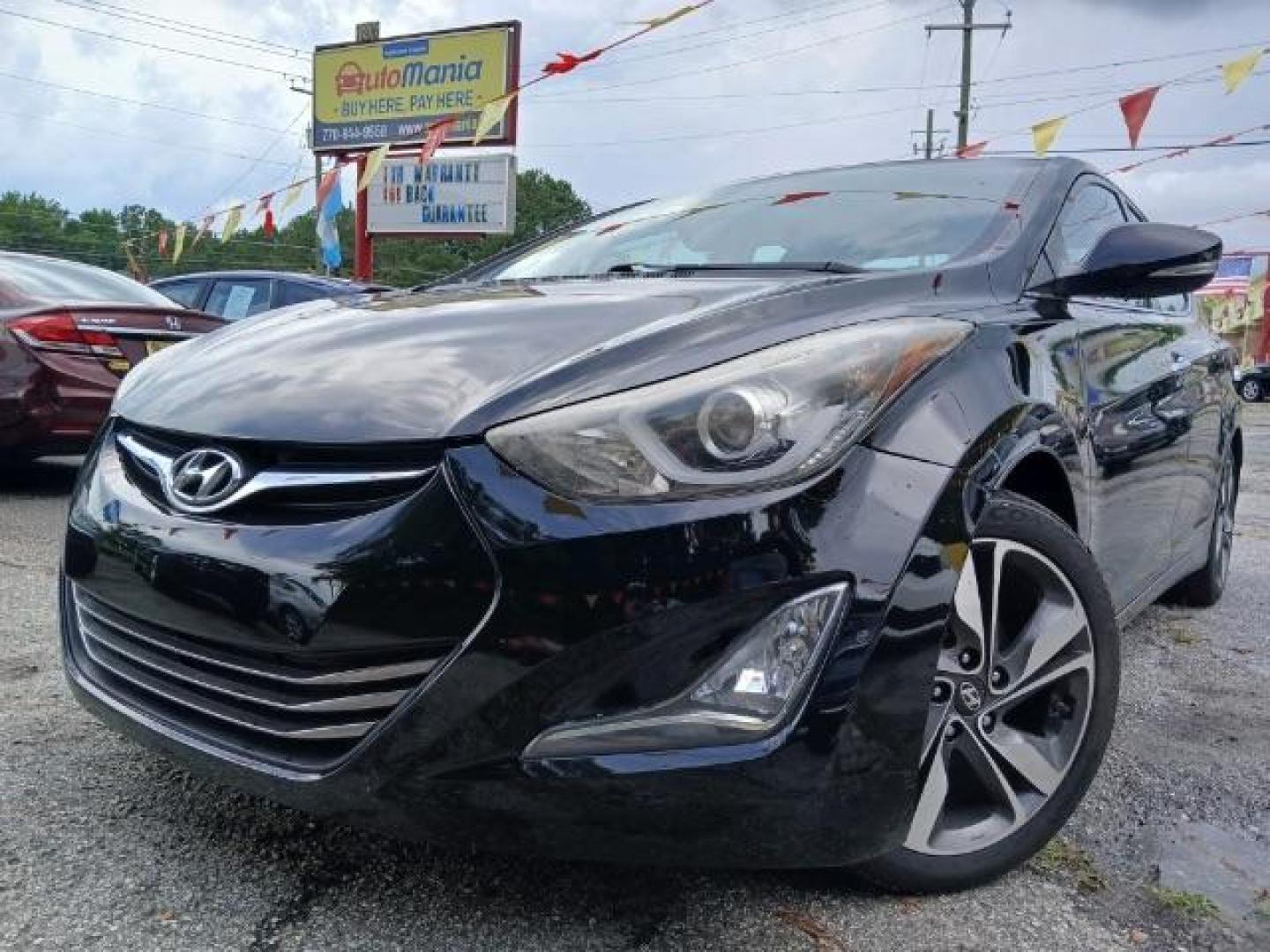 2016 Black Hyundai Elantra SE 6AT (KMHDH4AE4GU) with an 1.8L L4 DOHC 16V engine, 6-Speed Automatic transmission, located at 1806 Veterans Memorial Hwy SW, Austell, GA, 30168, (770) 944-9558, 33.817959, -84.606987 - Photo#2