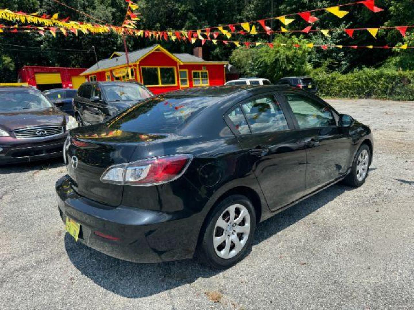 2013 Black Mazda MAZDA3 i SV AT 4-Door (JM1BL1TF3D1) with an 2.0L L4 DOHC 16V engine, 5-Speed Automatic transmission, located at 1806 Veterans Memorial Hwy SW, Austell, GA, 30168, (770) 944-9558, 33.817959, -84.606987 - Photo#1