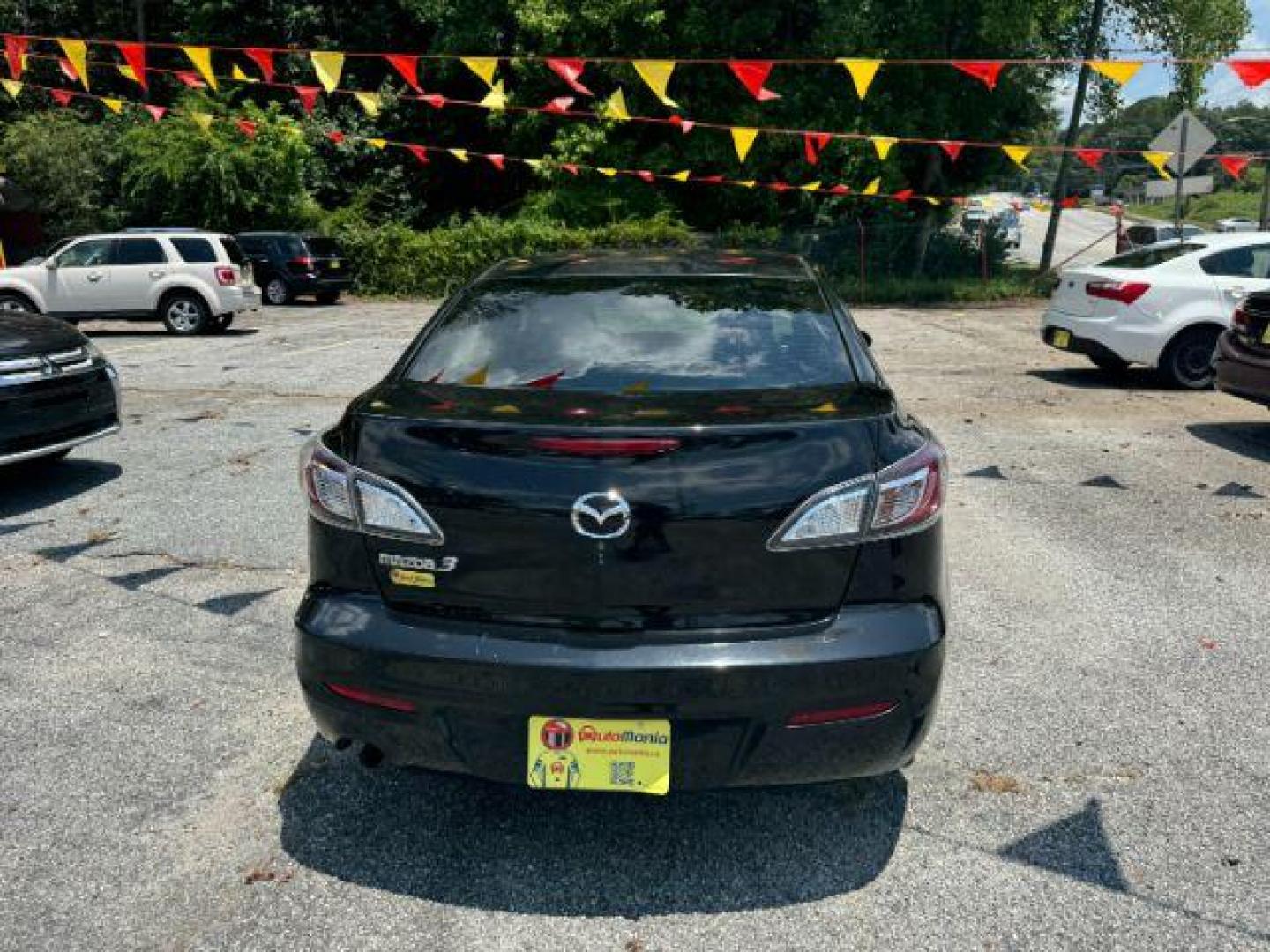 2013 Black Mazda MAZDA3 i SV AT 4-Door (JM1BL1TF3D1) with an 2.0L L4 DOHC 16V engine, 5-Speed Automatic transmission, located at 1806 Veterans Memorial Hwy SW, Austell, GA, 30168, (770) 944-9558, 33.817959, -84.606987 - Photo#4