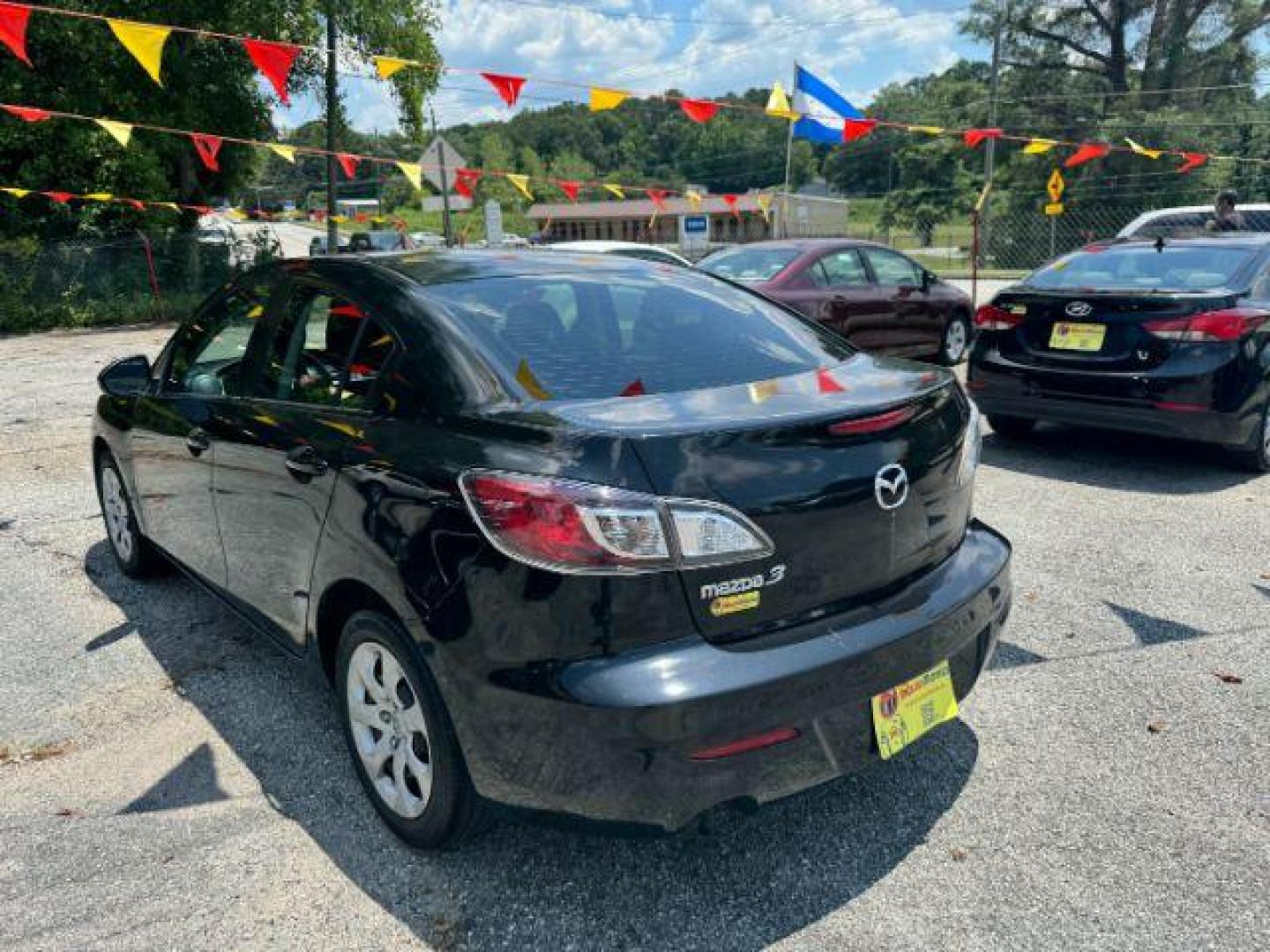 2013 Black Mazda MAZDA3 i SV AT 4-Door (JM1BL1TF3D1) with an 2.0L L4 DOHC 16V engine, 5-Speed Automatic transmission, located at 1806 Veterans Memorial Hwy SW, Austell, GA, 30168, (770) 944-9558, 33.817959, -84.606987 - Photo#5