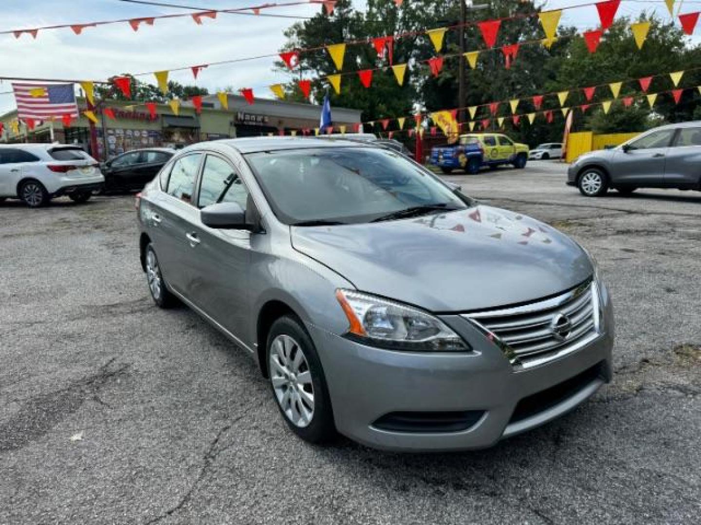 2014 Gray Nissan Sentra SEDAN 4-DR (3N1AB7AP2EL) with an 1.8L L4 SFI DOHC 16V engine, Continuously Variable Transmission transmission, located at 1806 Veterans Memorial Hwy SW, Austell, GA, 30168, (770) 944-9558, 33.817959, -84.606987 - Photo#2