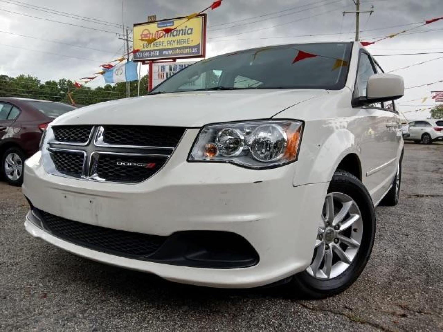 2013 White Dodge Grand Caravan SXT (2C4RDGCG2DR) with an 3.6L V6 DOHC 24V engine, 6-Speed Automatic transmission, located at 1806 Veterans Memorial Hwy SW, Austell, GA, 30168, (770) 944-9558, 33.817959, -84.606987 - Photo#0