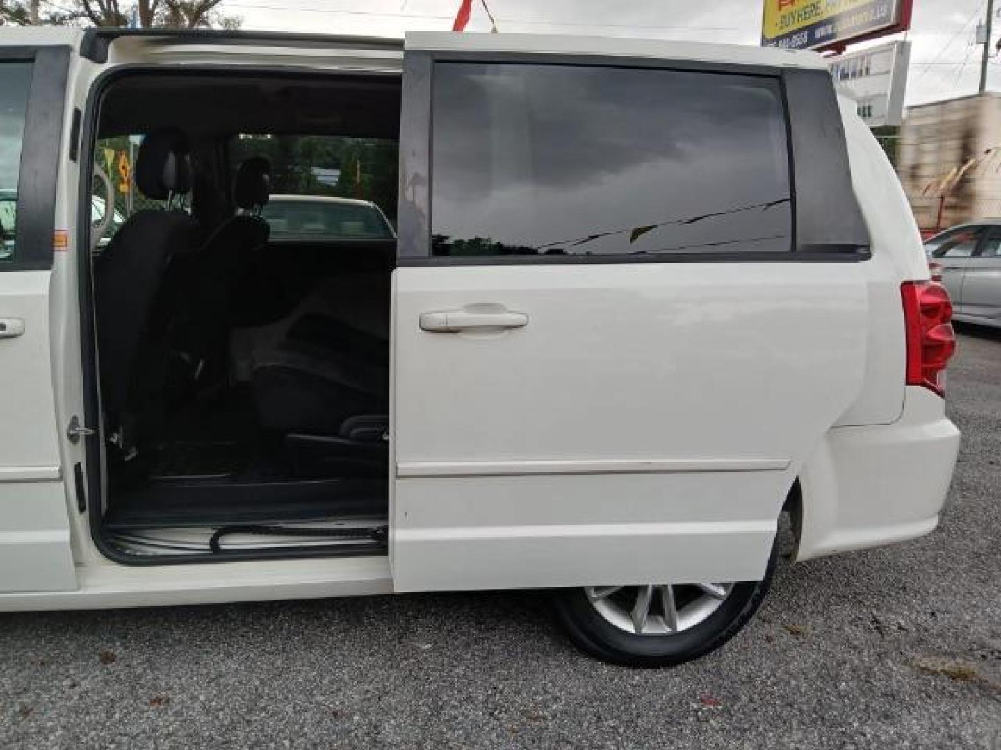 2013 White Dodge Grand Caravan SXT (2C4RDGCG2DR) with an 3.6L V6 DOHC 24V engine, 6-Speed Automatic transmission, located at 1806 Veterans Memorial Hwy SW, Austell, GA, 30168, (770) 944-9558, 33.817959, -84.606987 - Photo#14