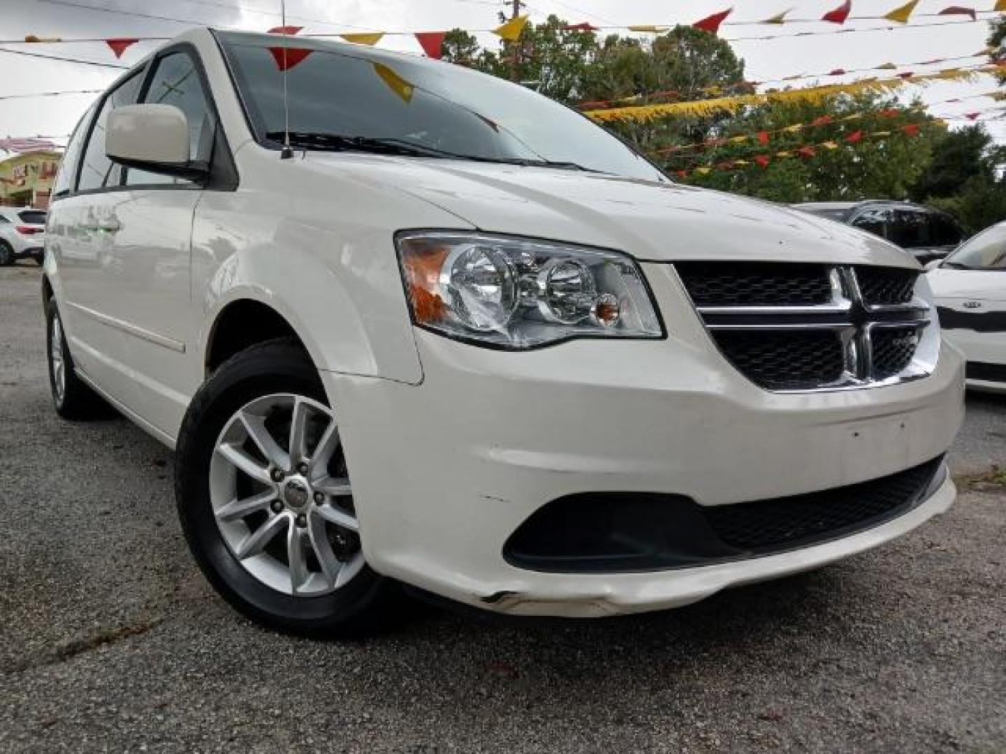 2013 White Dodge Grand Caravan SXT (2C4RDGCG2DR) with an 3.6L V6 DOHC 24V engine, 6-Speed Automatic transmission, located at 1806 Veterans Memorial Hwy SW, Austell, GA, 30168, (770) 944-9558, 33.817959, -84.606987 - Photo#2