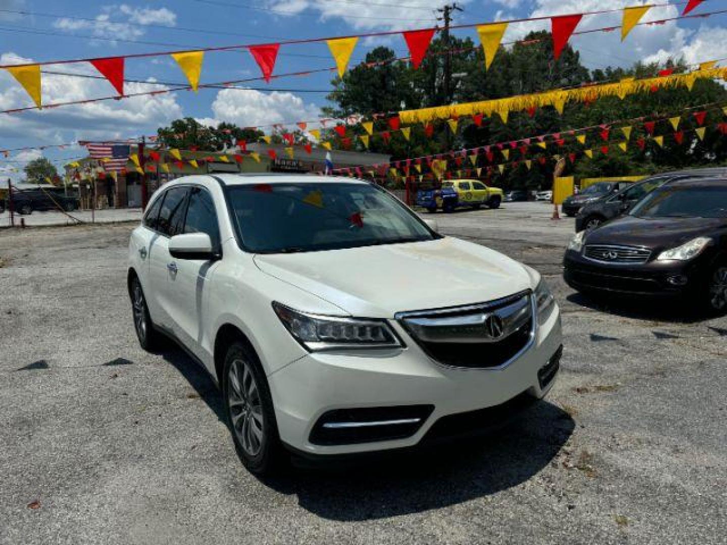 2015 White Acura MDX SPORT UTILITY 4-DR (5FRYD3H47FB) with an 3.5L V6 SOHC 24V engine, 6-Speed Automatic transmission, located at 1806 Veterans Memorial Hwy SW, Austell, GA, 30168, (770) 944-9558, 33.817959, -84.606987 - Photo#2