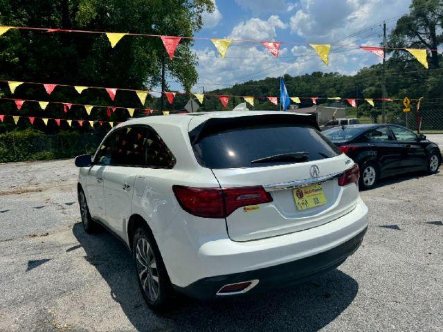 2015 White Acura MDX SPORT UTILITY 4-DR (5FRYD3H47FB) with an 3.5L V6 SOHC 24V engine, 6-Speed Automatic transmission, located at 1806 Veterans Memorial Hwy SW, Austell, GA, 30168, (770) 944-9558, 33.817959, -84.606987 - Photo#5