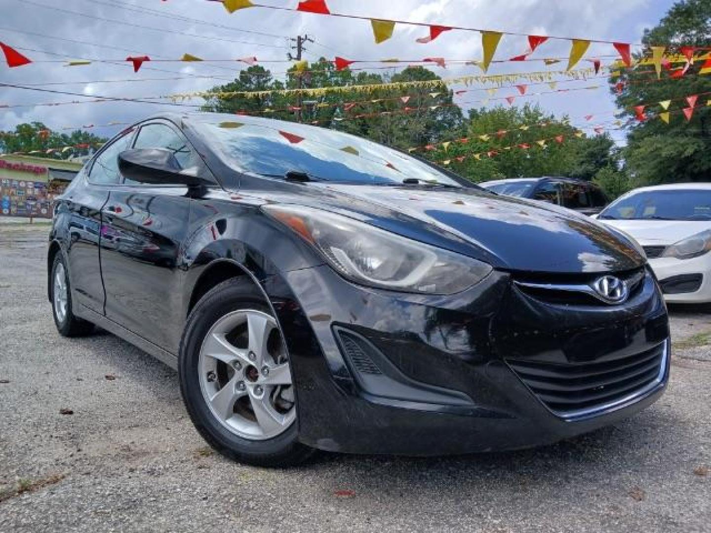 2015 Black Hyundai Elantra SE 6AT (KMHDH4AE8FU) with an 1.8L L4 DOHC 16V engine, 6-Speed Automatic transmission, located at 1806 Veterans Memorial Hwy SW, Austell, GA, 30168, (770) 944-9558, 33.817959, -84.606987 - Photo#0