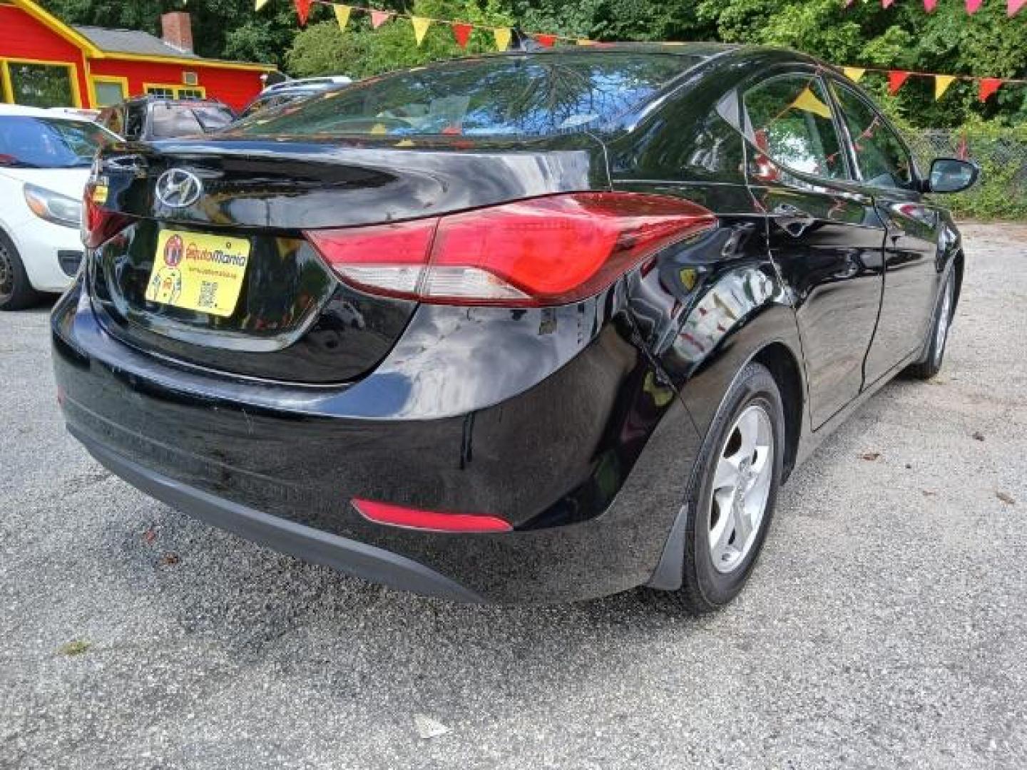 2015 Black Hyundai Elantra SE 6AT (KMHDH4AE8FU) with an 1.8L L4 DOHC 16V engine, 6-Speed Automatic transmission, located at 1806 Veterans Memorial Hwy SW, Austell, GA, 30168, (770) 944-9558, 33.817959, -84.606987 - Photo#5