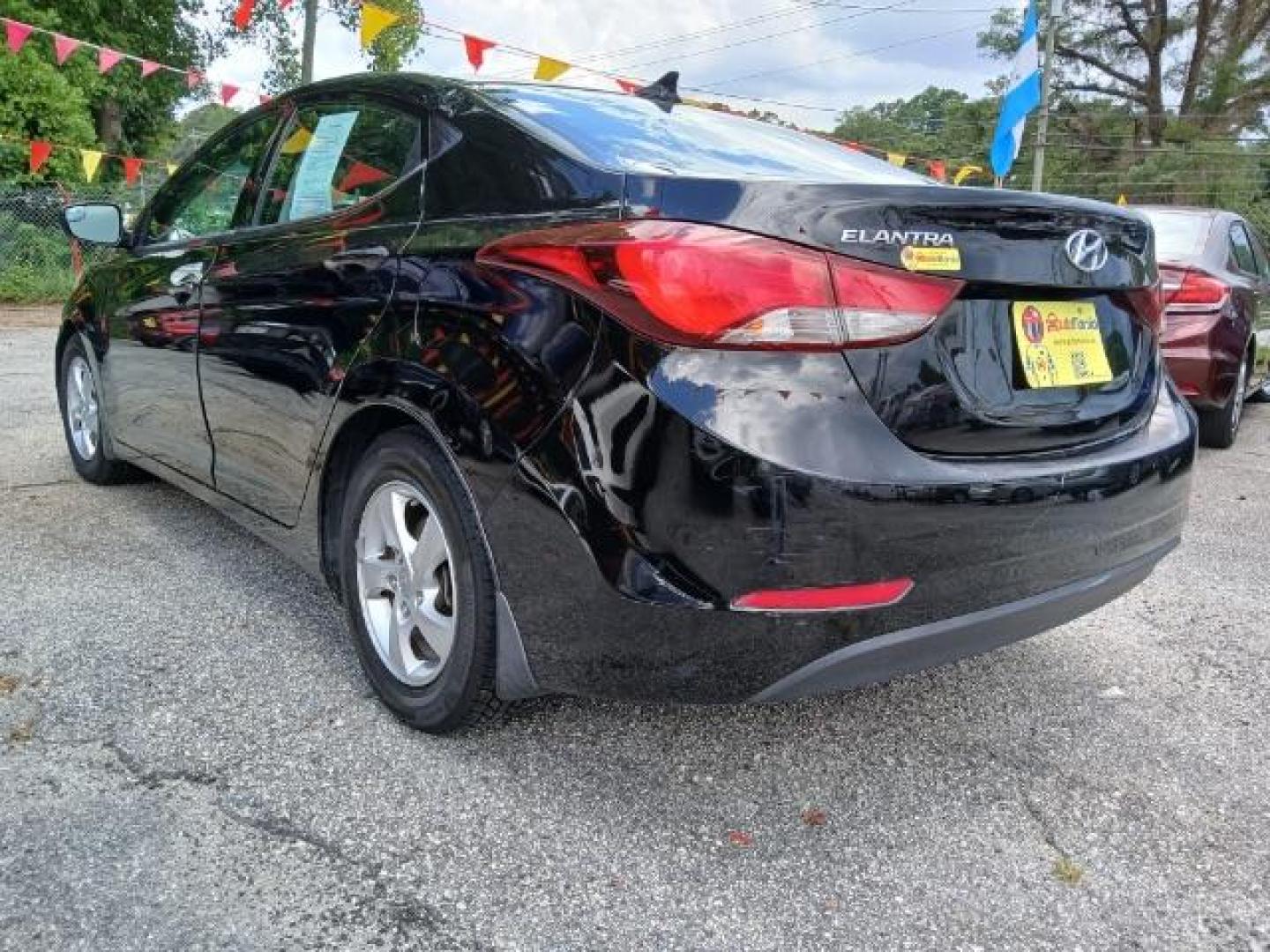 2015 Black Hyundai Elantra SE 6AT (KMHDH4AE8FU) with an 1.8L L4 DOHC 16V engine, 6-Speed Automatic transmission, located at 1806 Veterans Memorial Hwy SW, Austell, GA, 30168, (770) 944-9558, 33.817959, -84.606987 - Photo#6