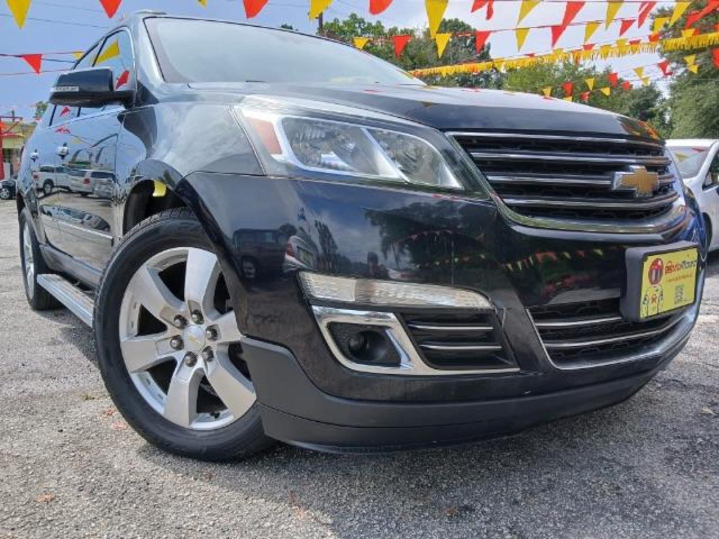 2014 Black Chevrolet Traverse LTZ AWD (1GNKVJKD0EJ) with an 3.6L V6 DOHC 24V engine, 6-Speed Automatic transmission, located at 1806 Veterans Memorial Hwy SW, Austell, GA, 30168, (770) 944-9558, 33.817959, -84.606987 - Photo#0