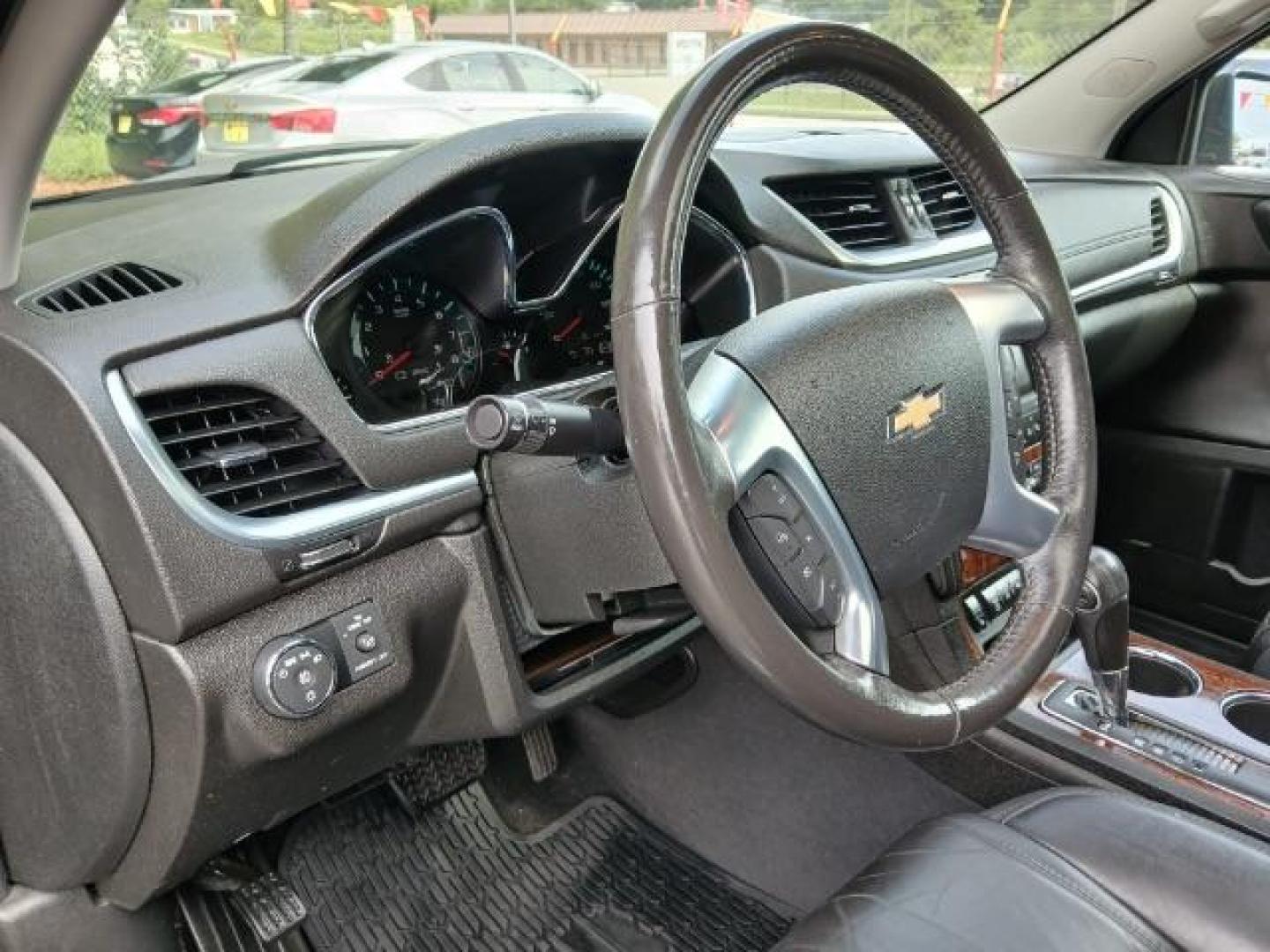 2014 Black Chevrolet Traverse LTZ AWD (1GNKVJKD0EJ) with an 3.6L V6 DOHC 24V engine, 6-Speed Automatic transmission, located at 1806 Veterans Memorial Hwy SW, Austell, GA, 30168, (770) 944-9558, 33.817959, -84.606987 - Photo#10