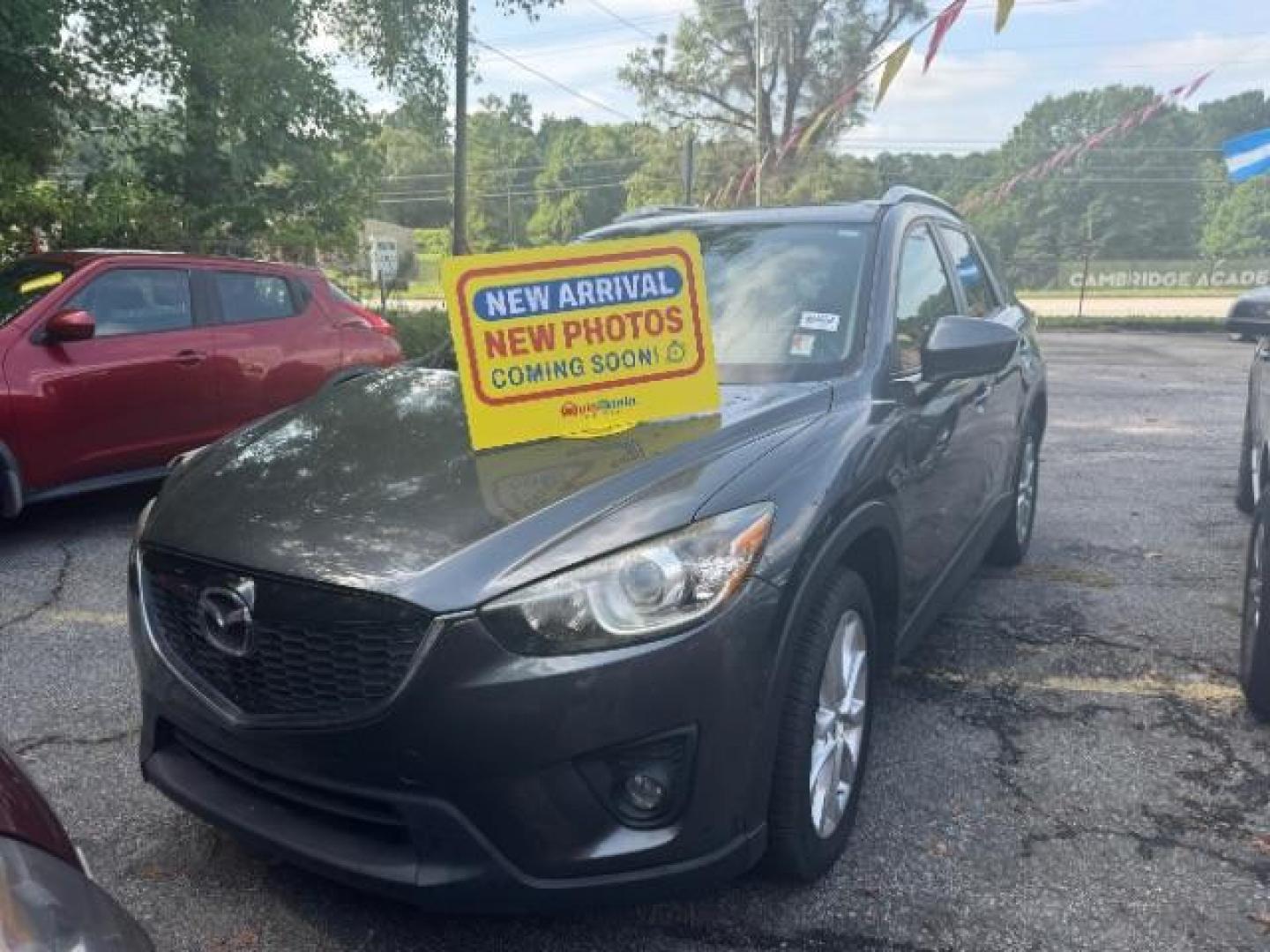 2014 Gray Mazda CX-5 Grand Touring (JM3KE2DY6E0) with an 2.5L L4 DOHC 16V engine, 6-Speed Automatic transmission, located at 1806 Veterans Memorial Hwy SW, Austell, GA, 30168, (770) 944-9558, 33.817959, -84.606987 - Photo#0