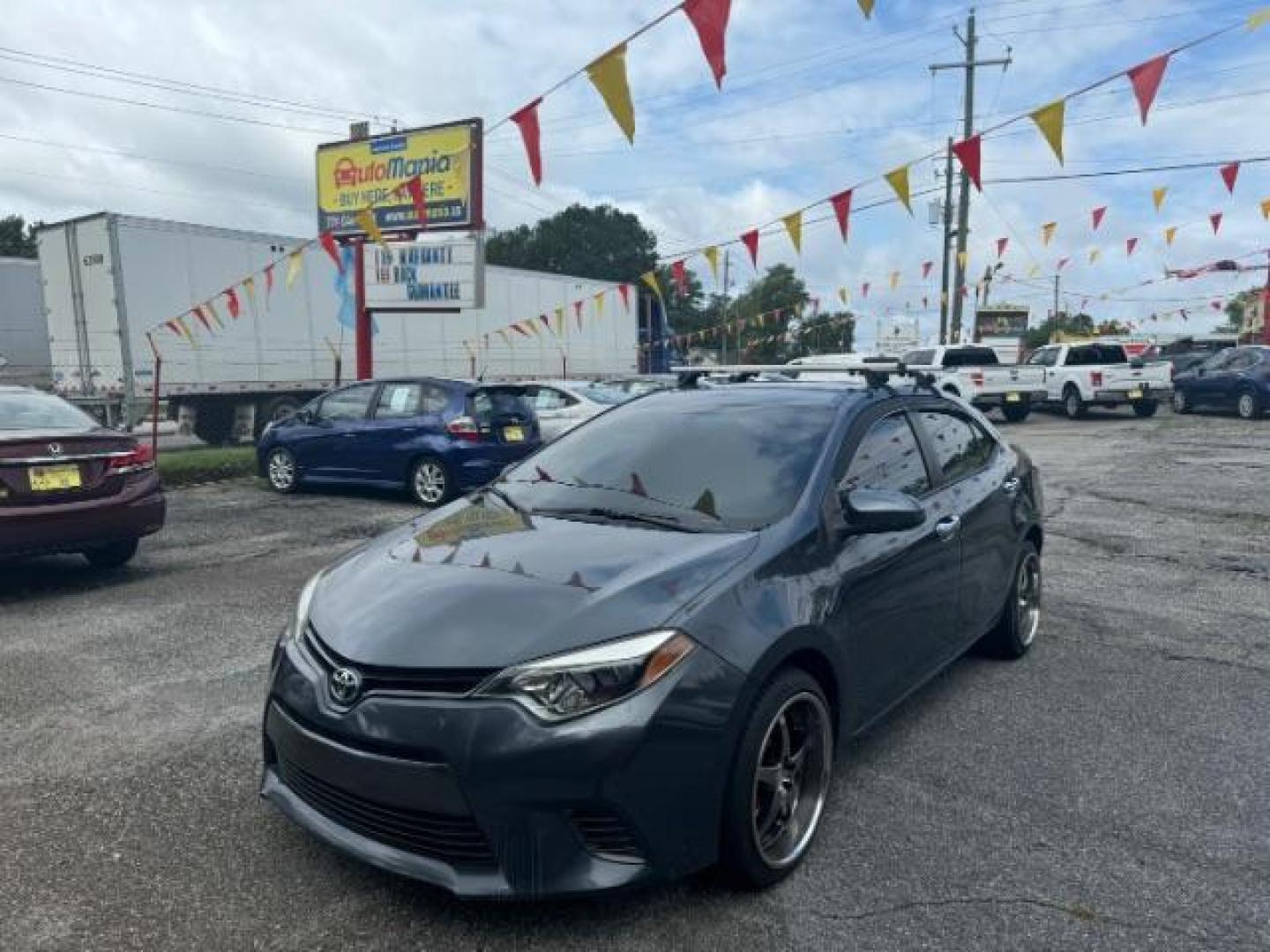 2016 Silver Toyota Corolla L 4-Speed AT (5YFBURHE6GP) with an 1.8L L4 DOHC 16V engine, 4-Speed Automatic transmission, located at 1806 Veterans Memorial Hwy SW, Austell, GA, 30168, (770) 944-9558, 33.817959, -84.606987 - Photo#0