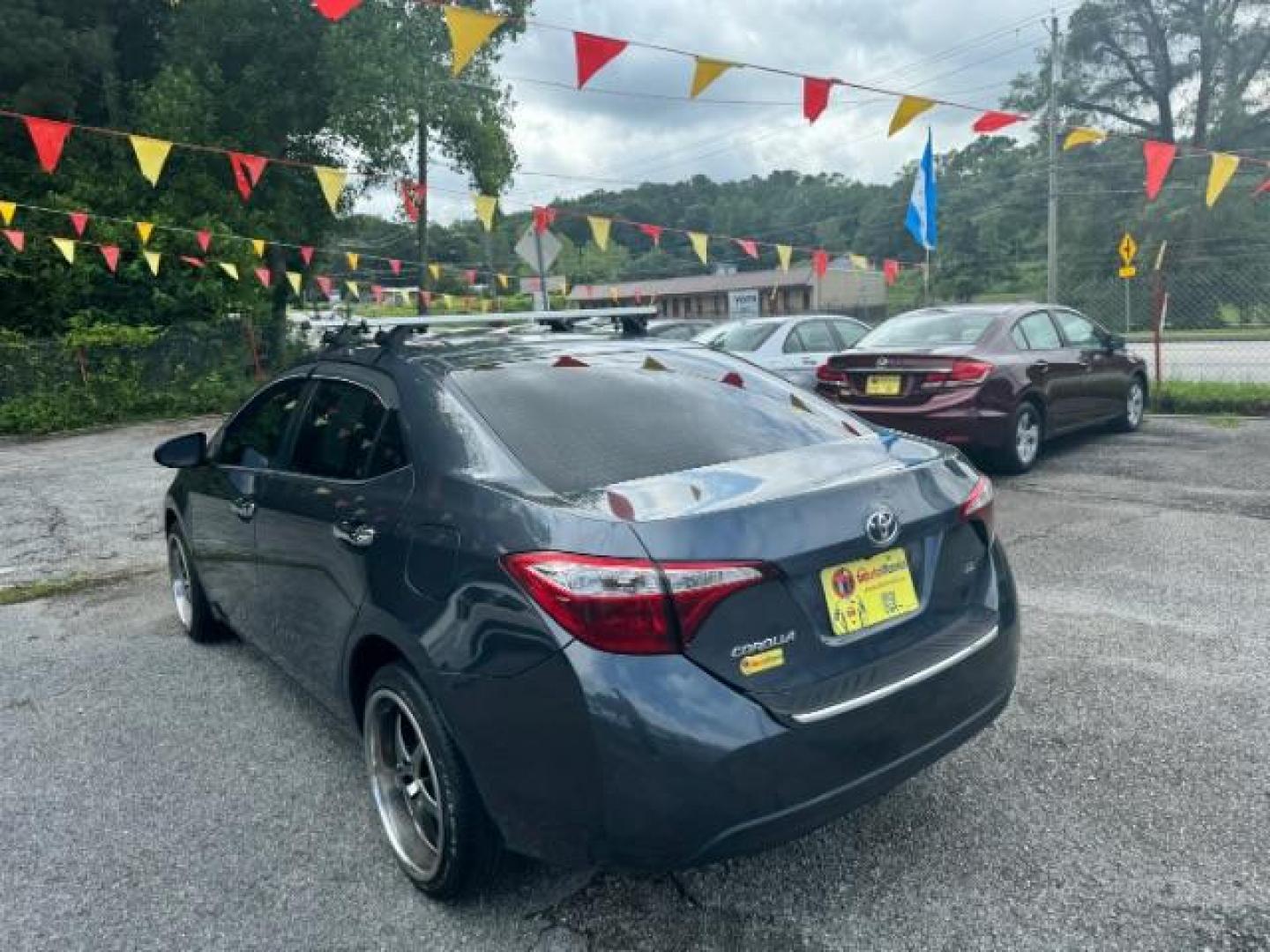 2016 Silver Toyota Corolla L 4-Speed AT (5YFBURHE6GP) with an 1.8L L4 DOHC 16V engine, 4-Speed Automatic transmission, located at 1806 Veterans Memorial Hwy SW, Austell, GA, 30168, (770) 944-9558, 33.817959, -84.606987 - Photo#2