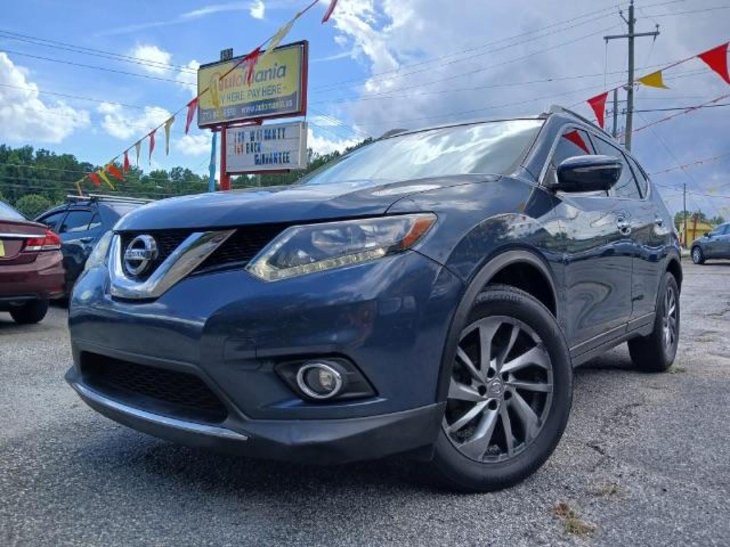 2015 Blue Nissan Rogue S 2WD (5N1AT2MT6FC) with an 2.5L L4 DOHC 16V engine, Continuously Variable Transmission transmission, located at 1806 Veterans Memorial Hwy SW, Austell, GA, 30168, (770) 944-9558, 33.817959, -84.606987 - Photo#2