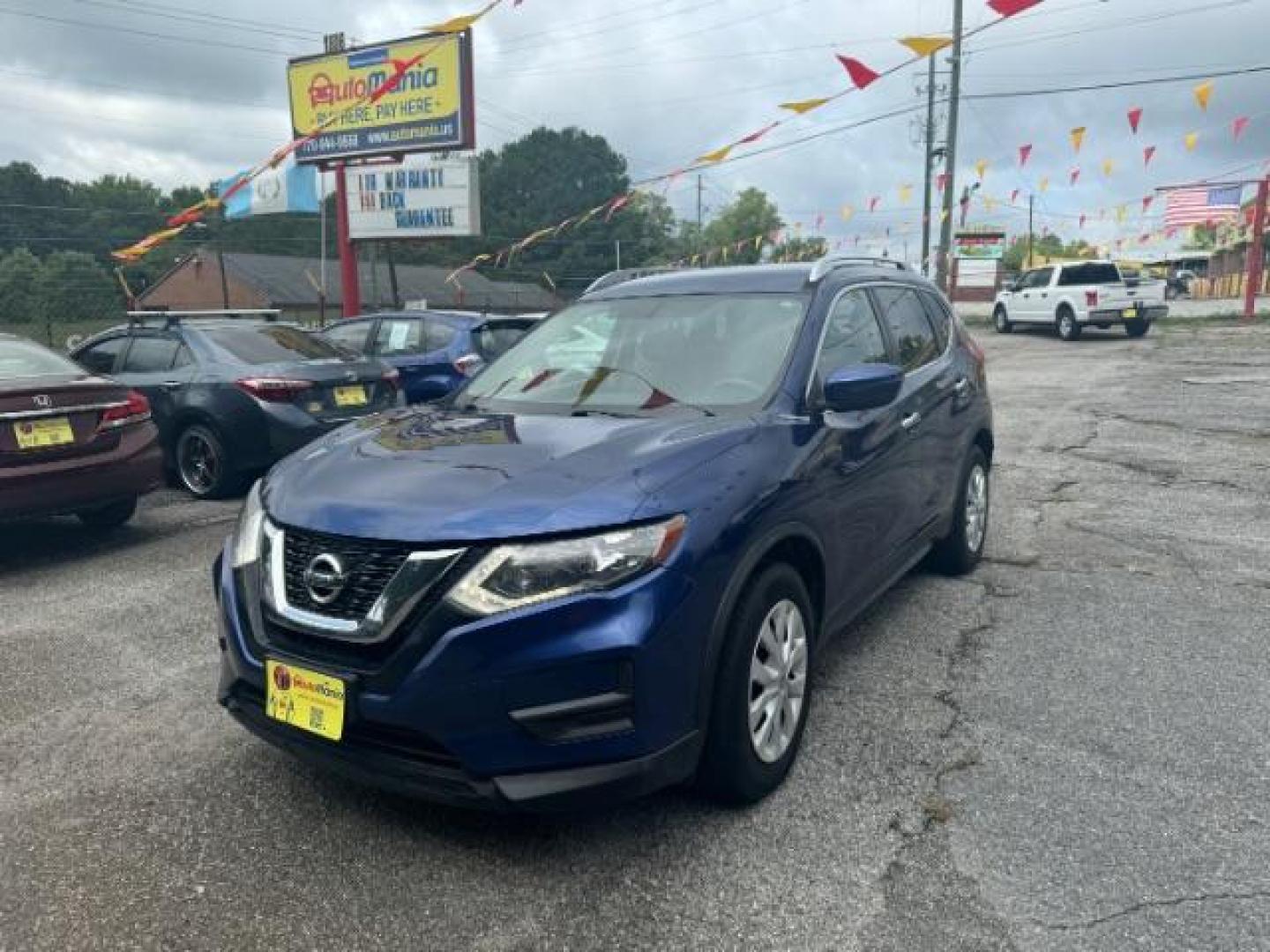 2017 Blue Nissan Rogue S 2WD (JN8AT2MT9HW) with an 2.5L L4 DOHC 16V engine, Continuously Variable Transmission transmission, located at 1806 Veterans Memorial Hwy SW, Austell, GA, 30168, (770) 944-9558, 33.817959, -84.606987 - Photo#0