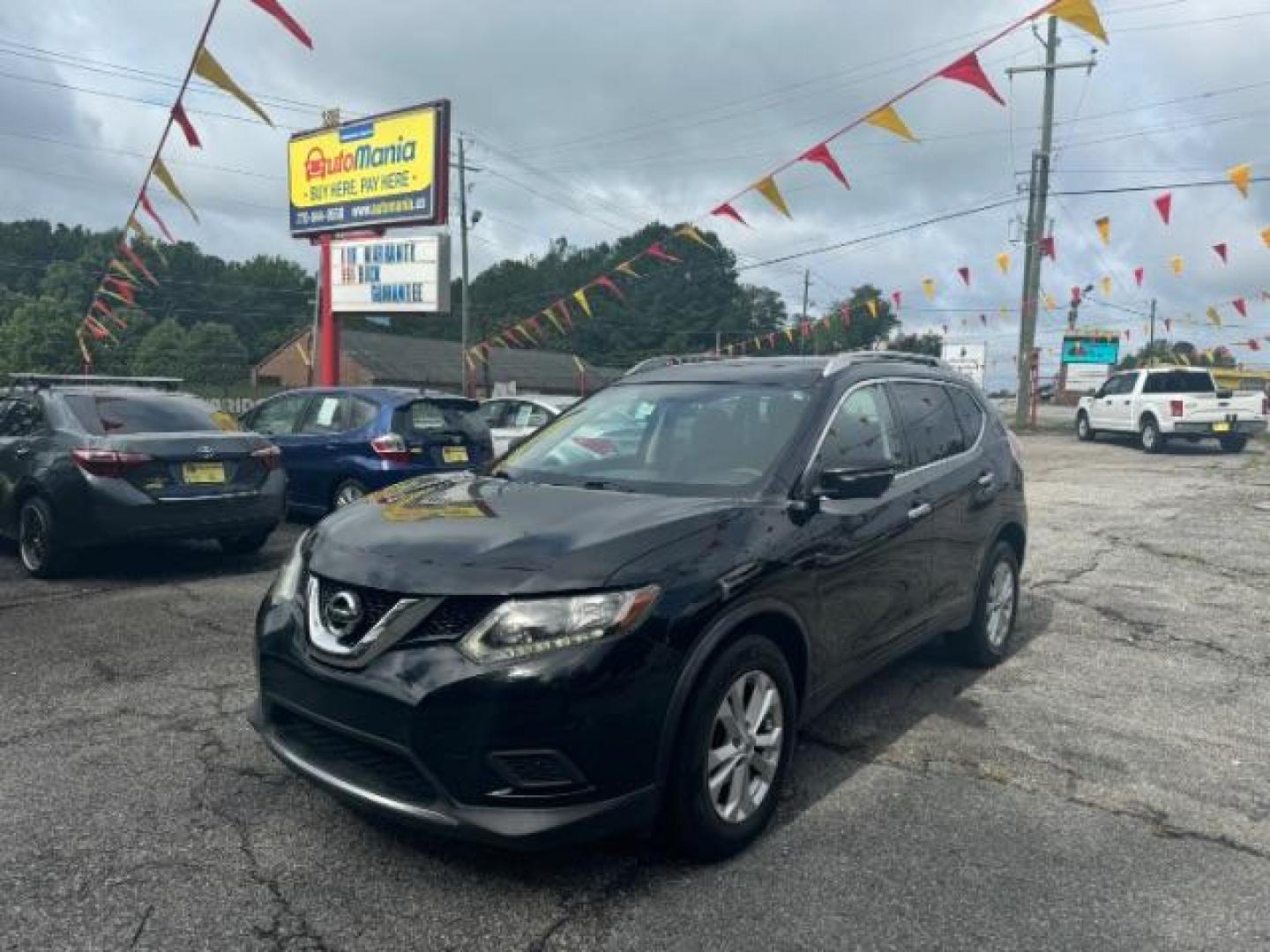 2015 Black Nissan Rogue SV 2WD (KNMAT2MT9FP) with an 2.5L L4 DOHC 16V engine, Continuously Variable Transmission transmission, located at 1806 Veterans Memorial Hwy SW, Austell, GA, 30168, (770) 944-9558, 33.817959, -84.606987 - Photo#0