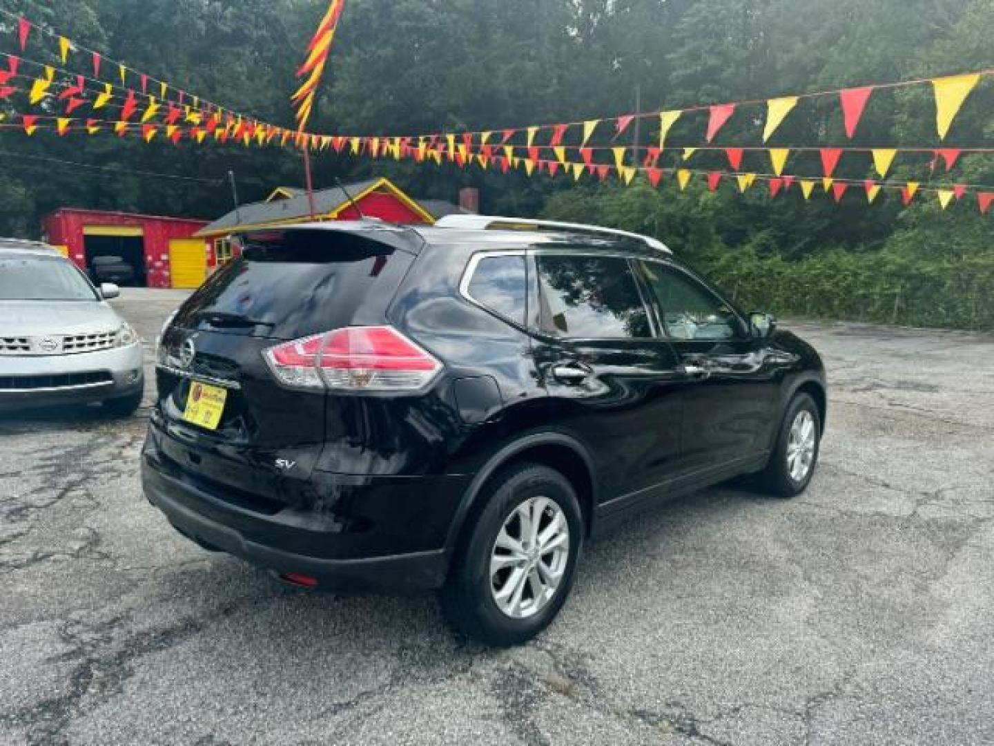 2015 Black Nissan Rogue SV 2WD (KNMAT2MT9FP) with an 2.5L L4 DOHC 16V engine, Continuously Variable Transmission transmission, located at 1806 Veterans Memorial Hwy SW, Austell, GA, 30168, (770) 944-9558, 33.817959, -84.606987 - Photo#1